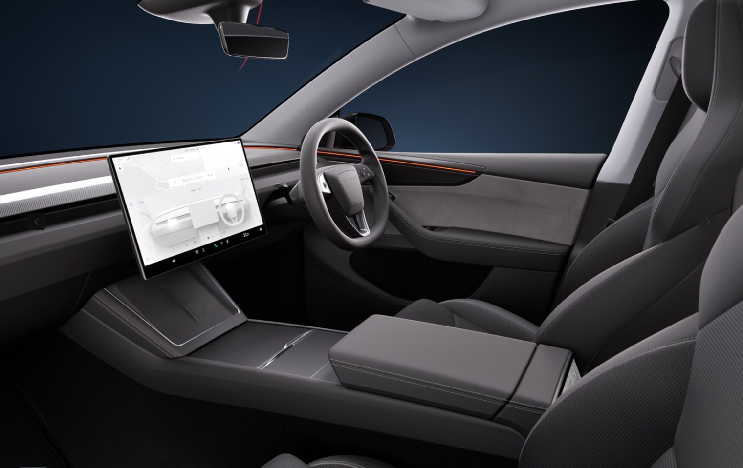 A bigger touchscreen, carbon fibre trim and sports seats mark out the interior of the Tesla Model Y Performance
