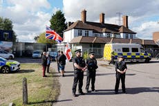 Two men charged after police officers injured at Epping asylum hotel protest
