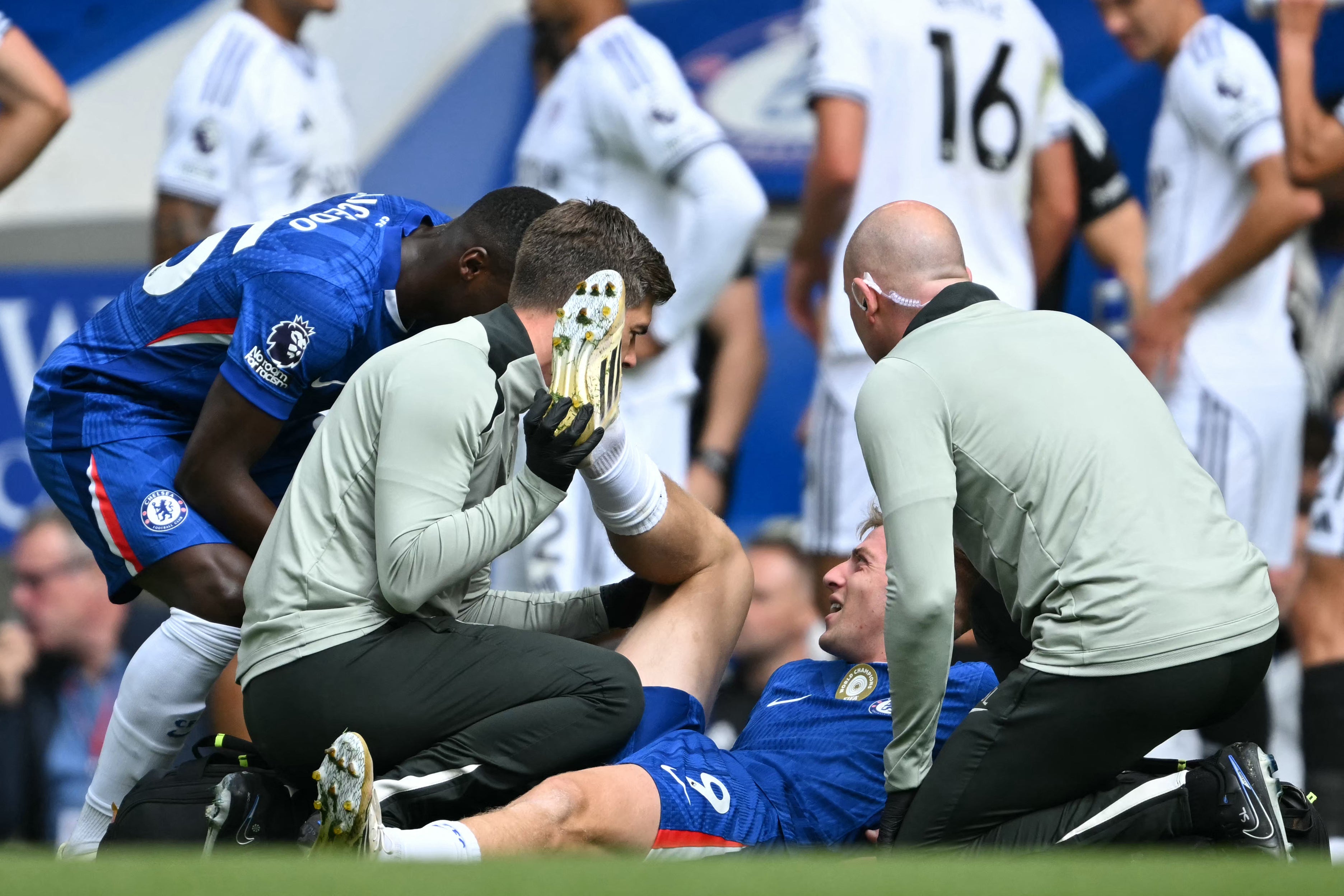 Liam Delap receives treatment after picking up an injury