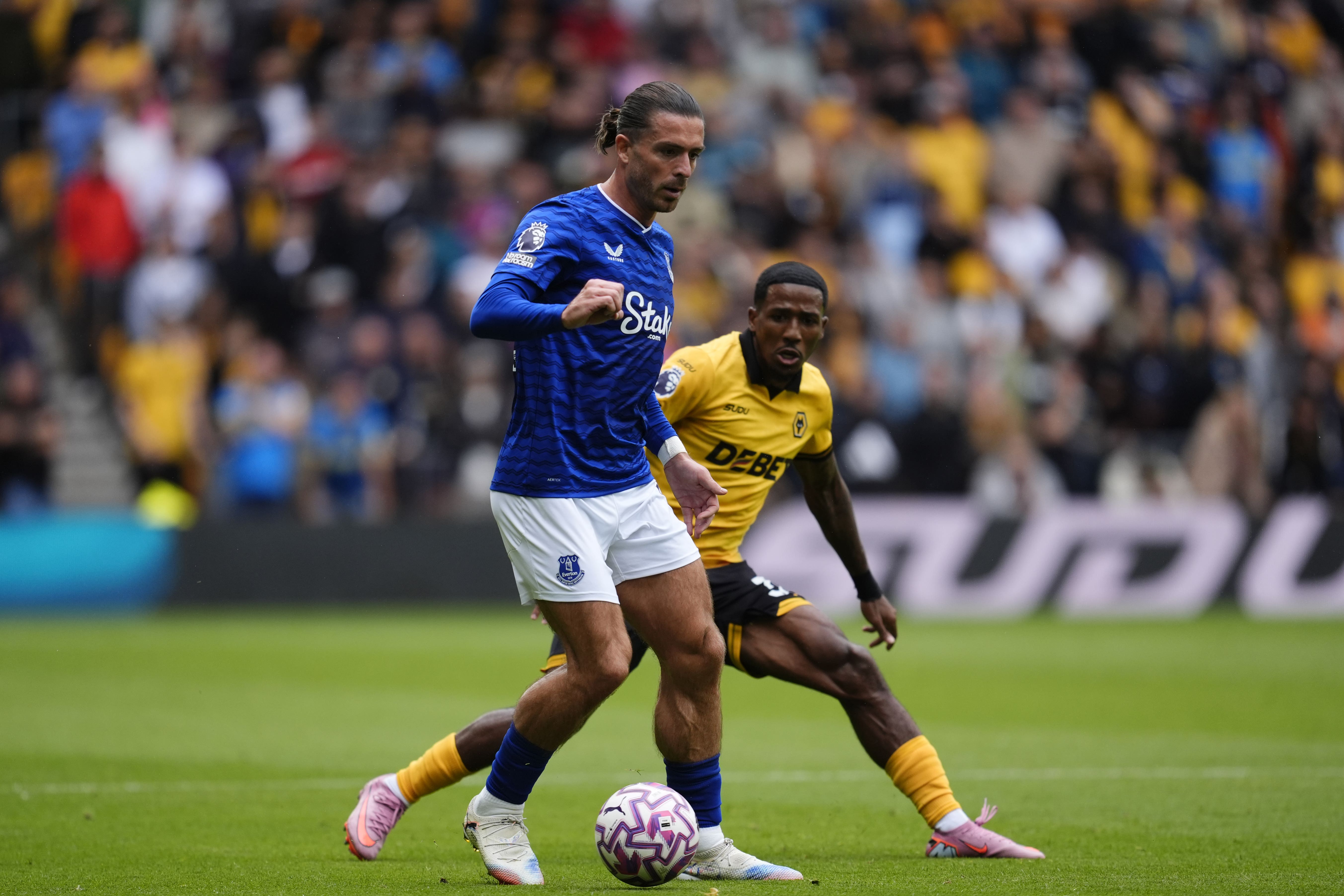 Jack Grealish, left, made two goals as Everton beat Wolves 3-2 (Nick Potts/PA)