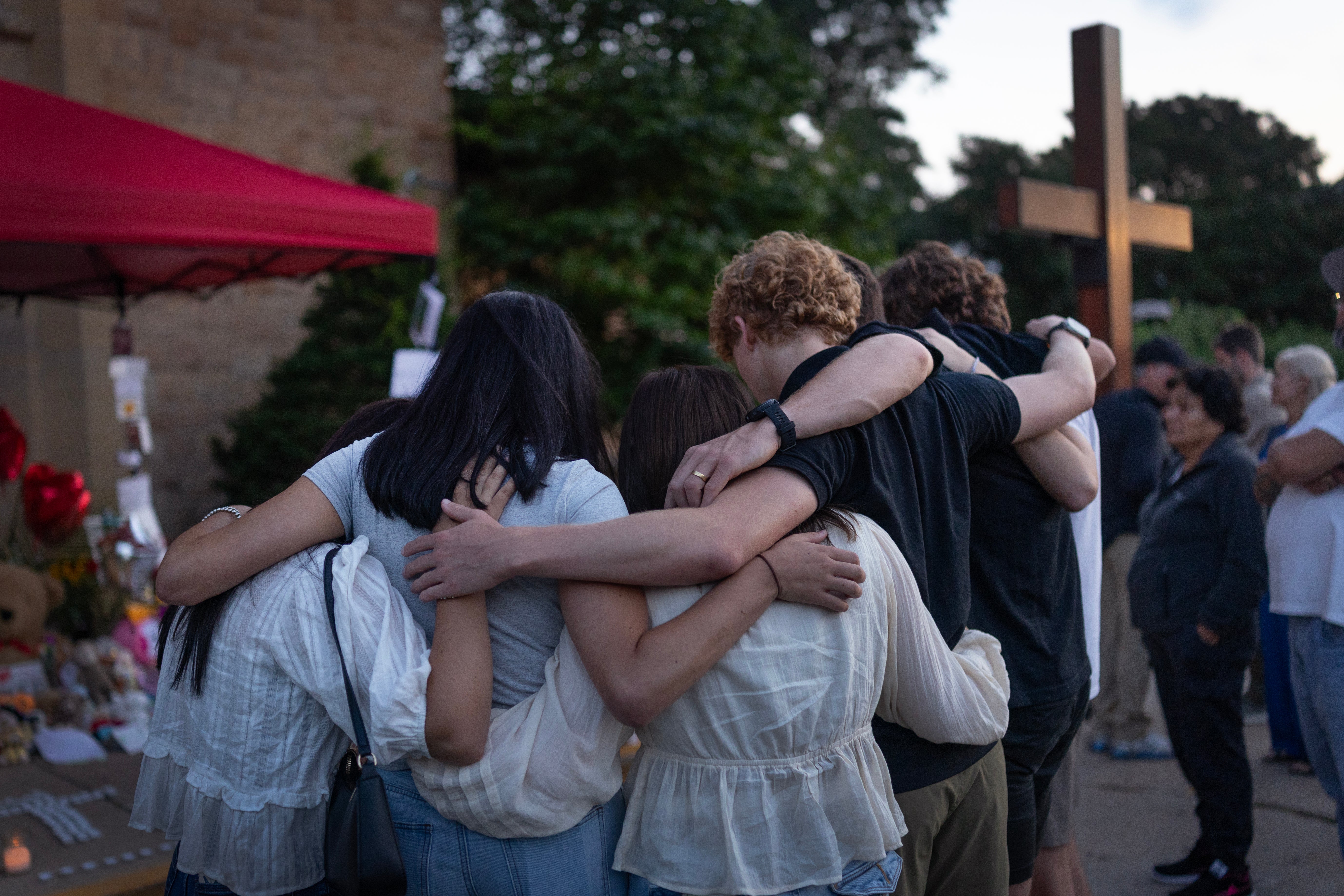 Two children were killed and 18 more were injured in the shooting at Annunciation Catholic School