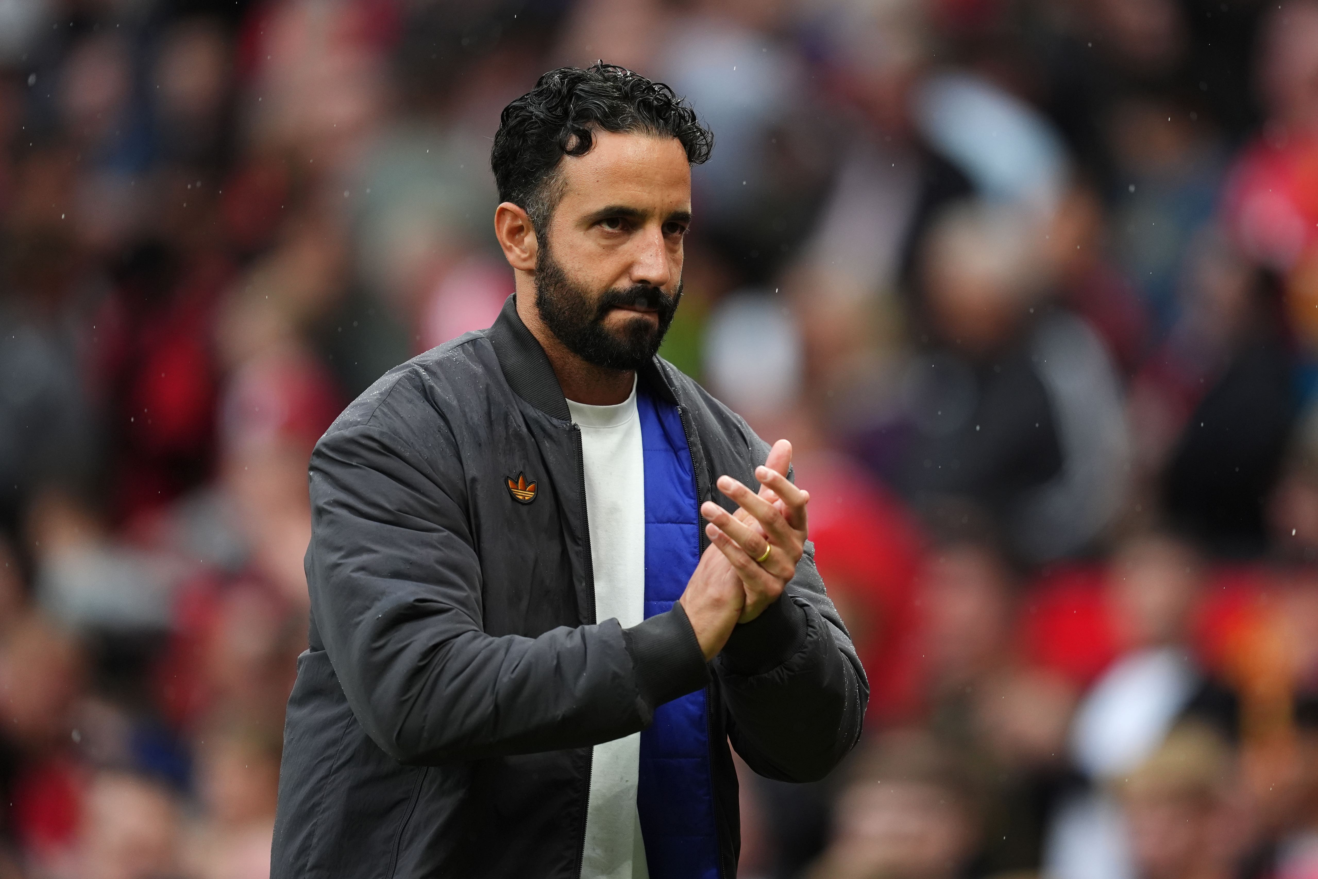 Manchester United manager Ruben Amorim applauds the fans after his side’s much-needed late victory (Martin Rickett/PA)