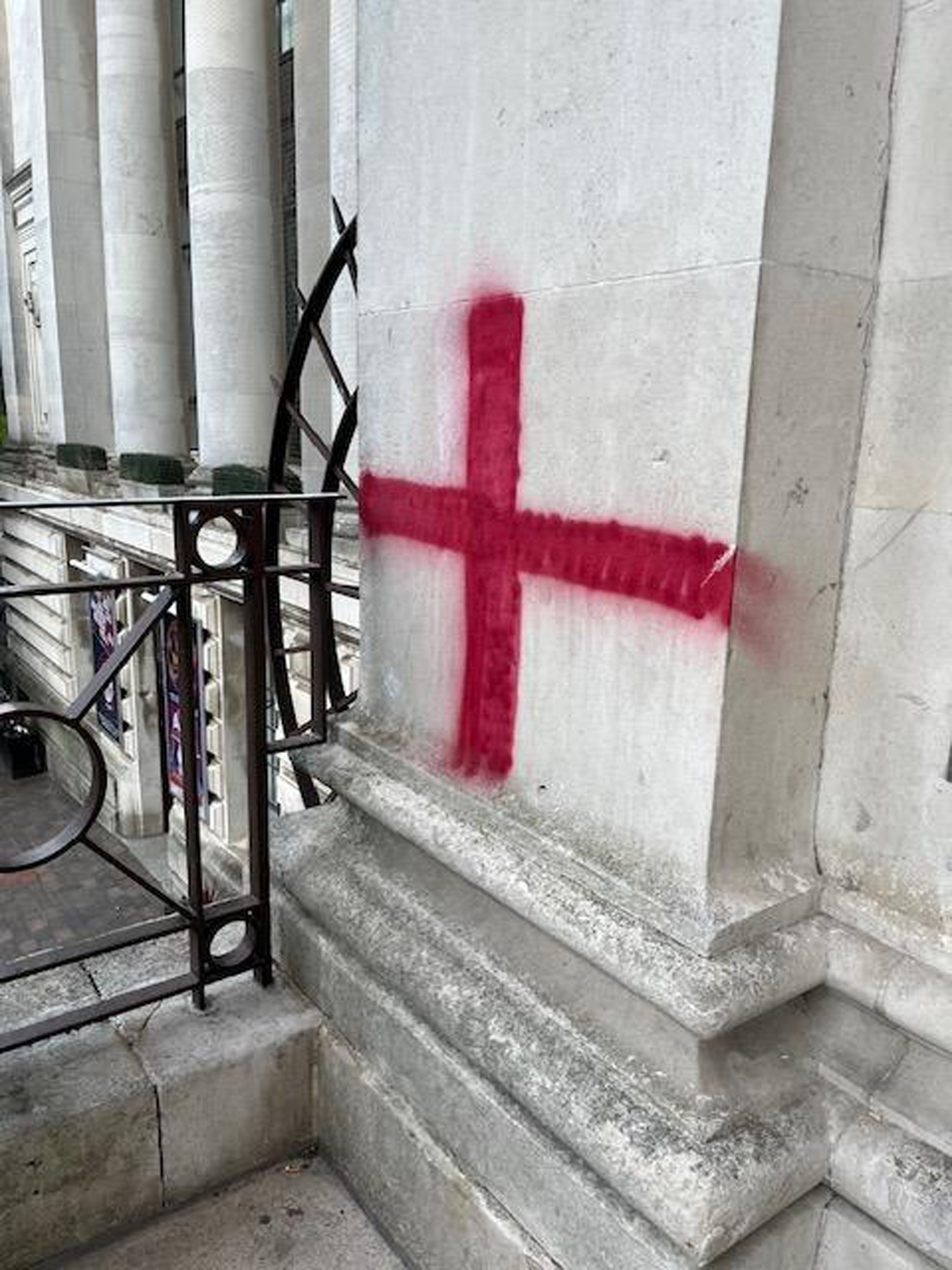 Vandals painted the cross on the exterior of Portsmouth Guildhall
