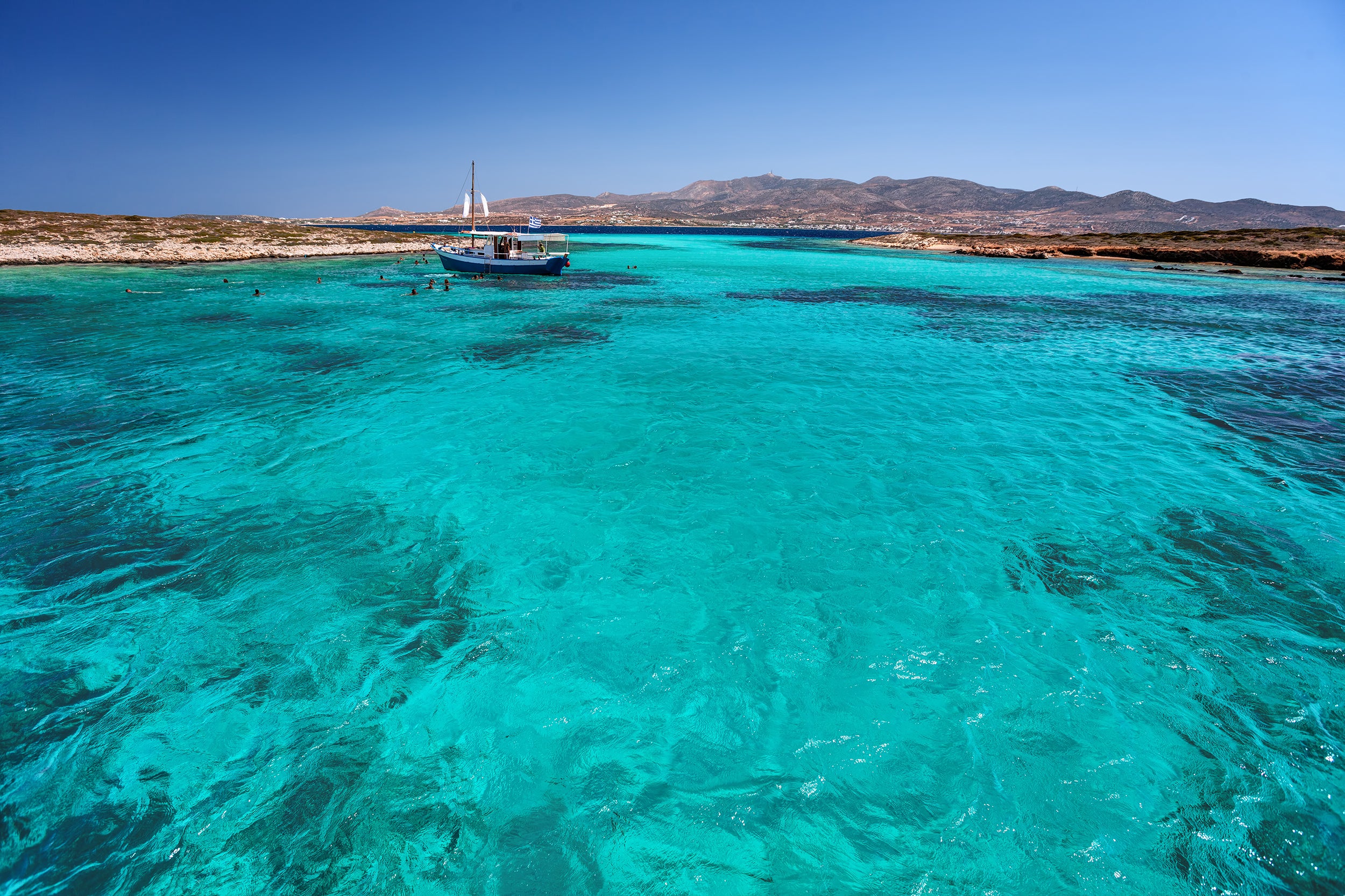 The Blue Lagoon between Paros and nearby island Antiparos is one of the spellbinding stops on a speedboat cruise