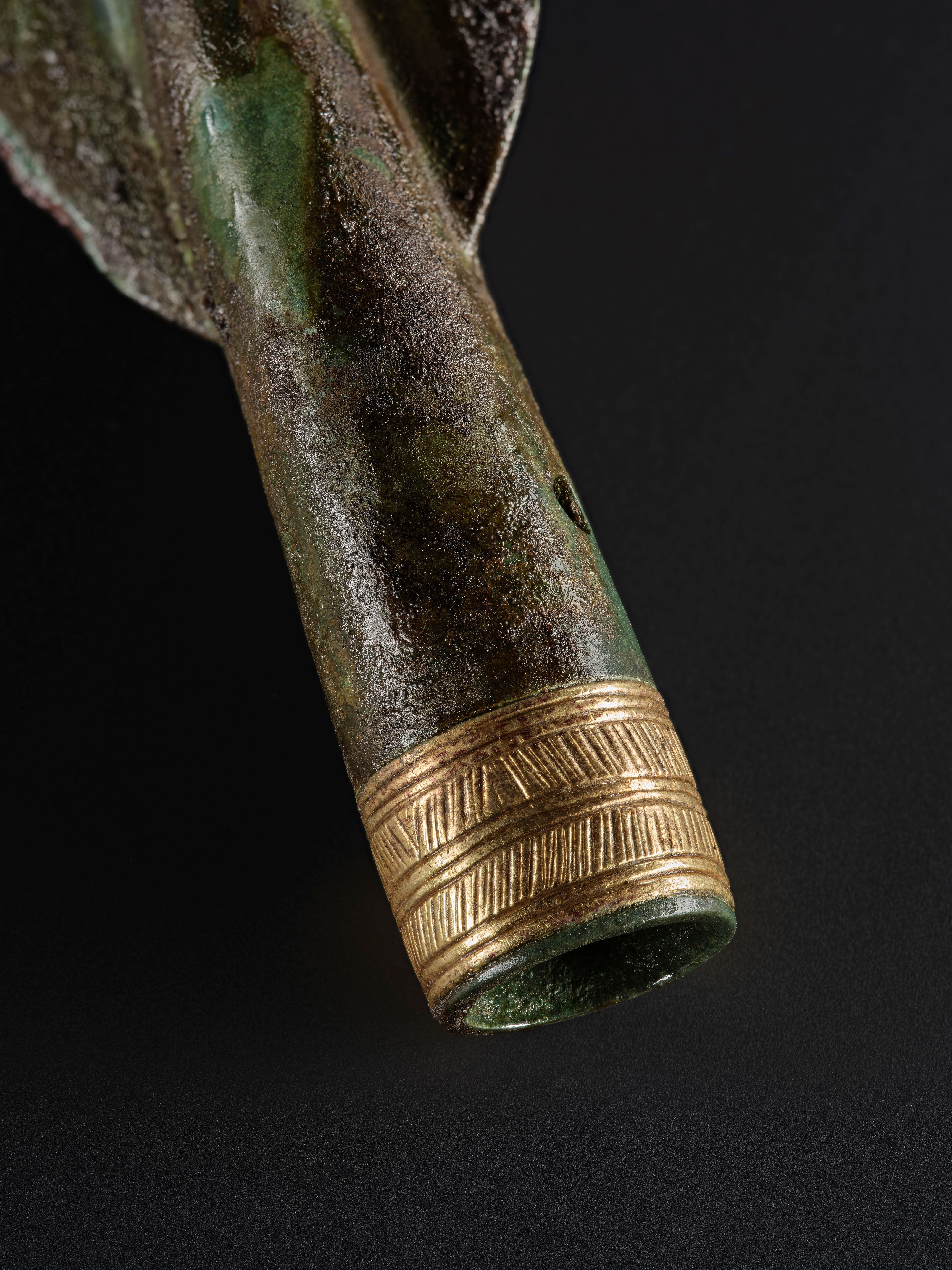 The spearhead, with its intricately-decorated socket is one of only two such examples known from Scotland