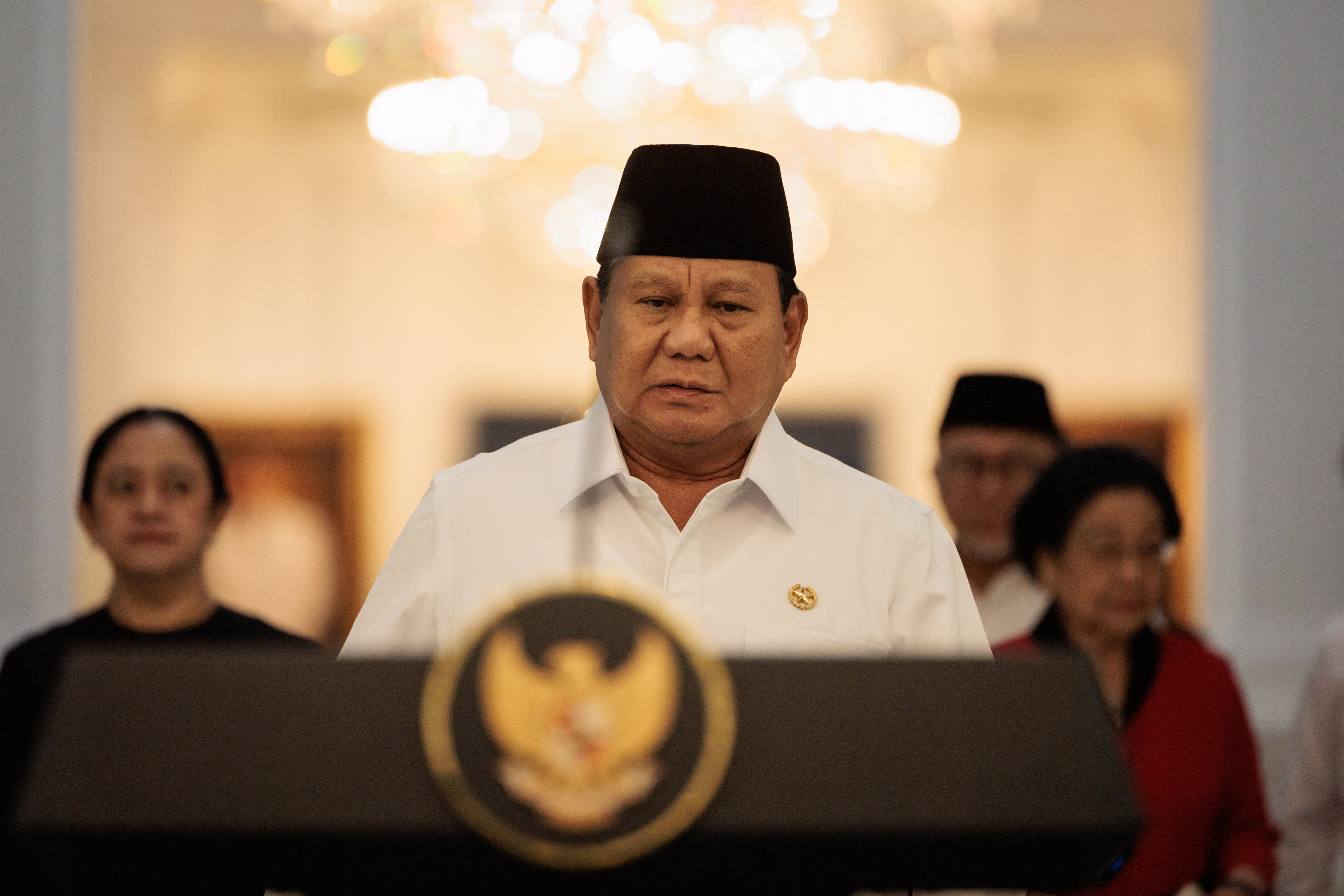Indonesia’s president Prabowo Subianto walks to speak about a recent wave of nationwide protests during a press conference alongside political party leaders at the Presidential Palace in Jakarta on 31 August 2025
