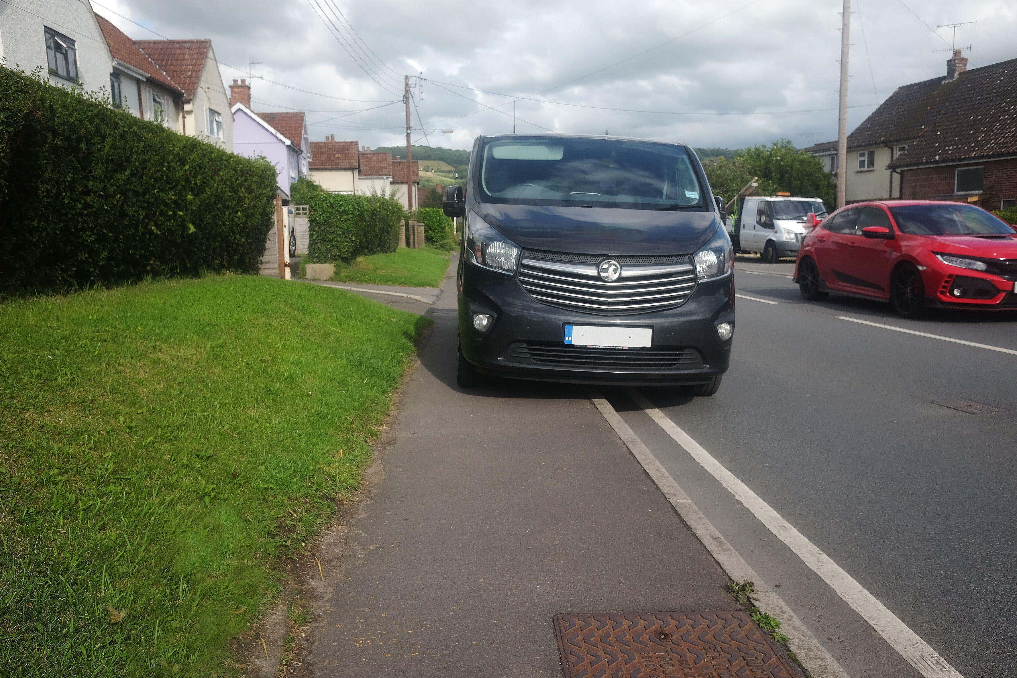 A majority of drivers want the government to tackle pavement parking in England