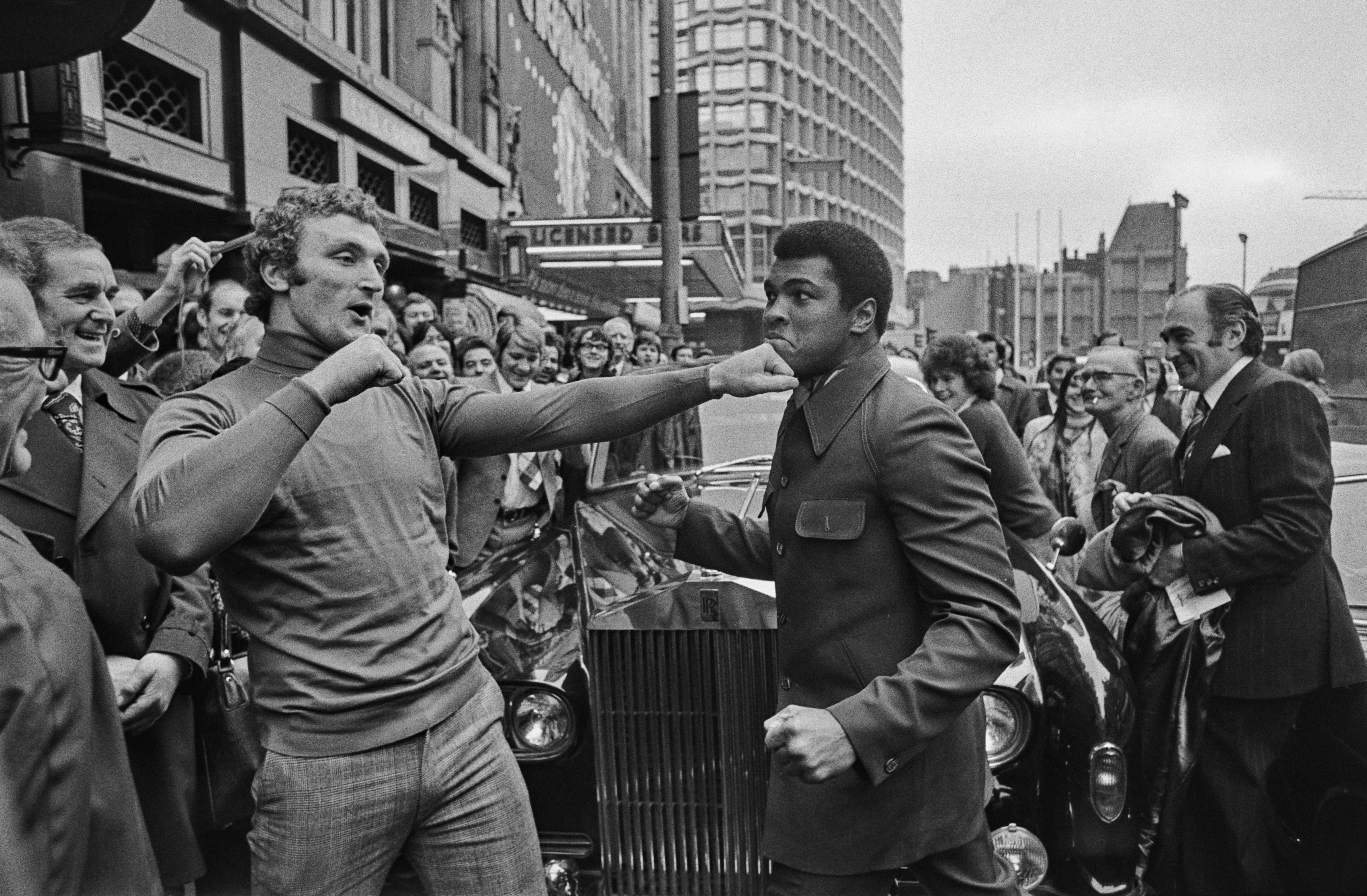 Bugner and Ali on Tottenham Court Road in 1974