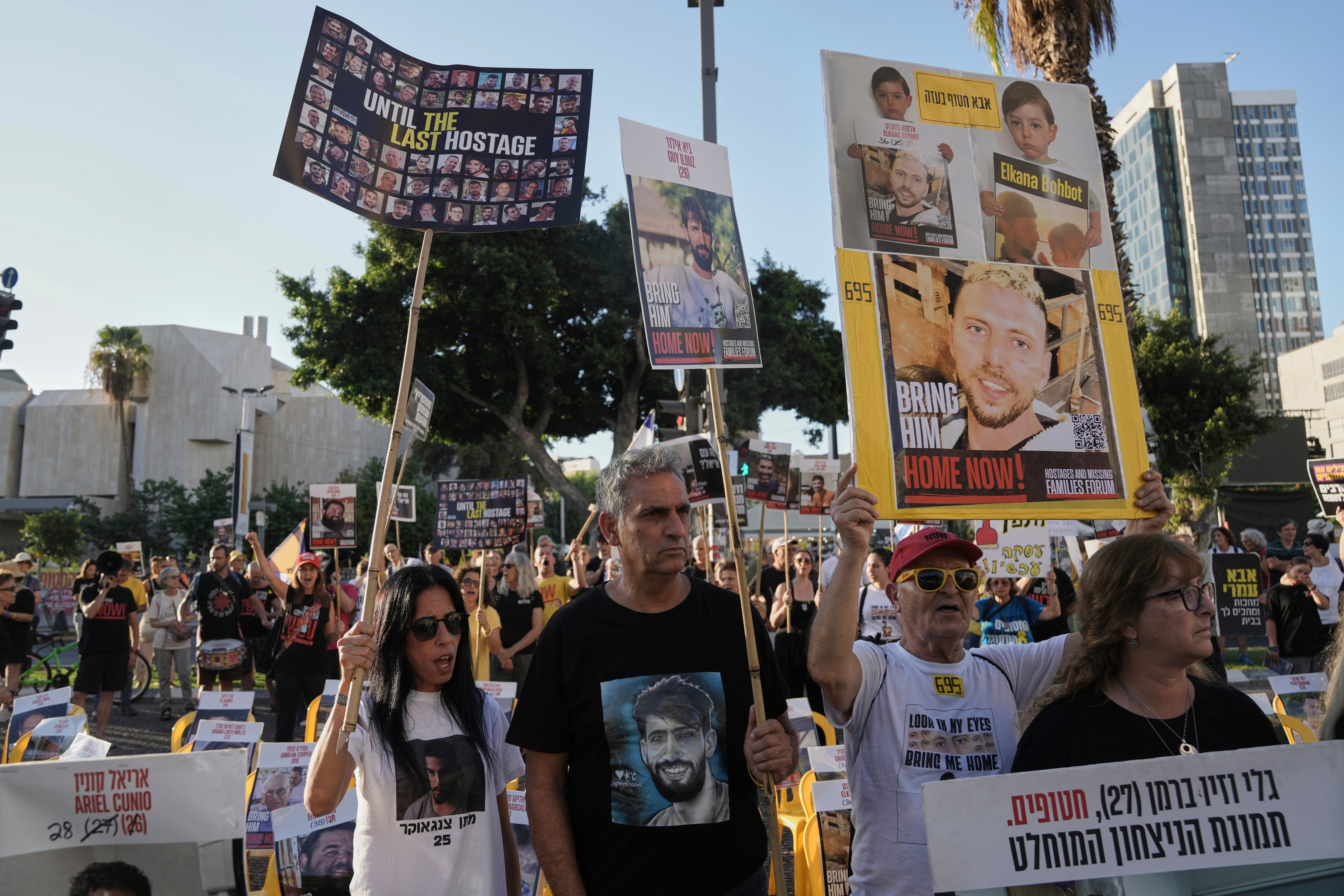 Relatives and supporters of Israeli hostages take part in a protest in Tel Aviv demanding their immediate release and against the Israeli offensive in Gaza City