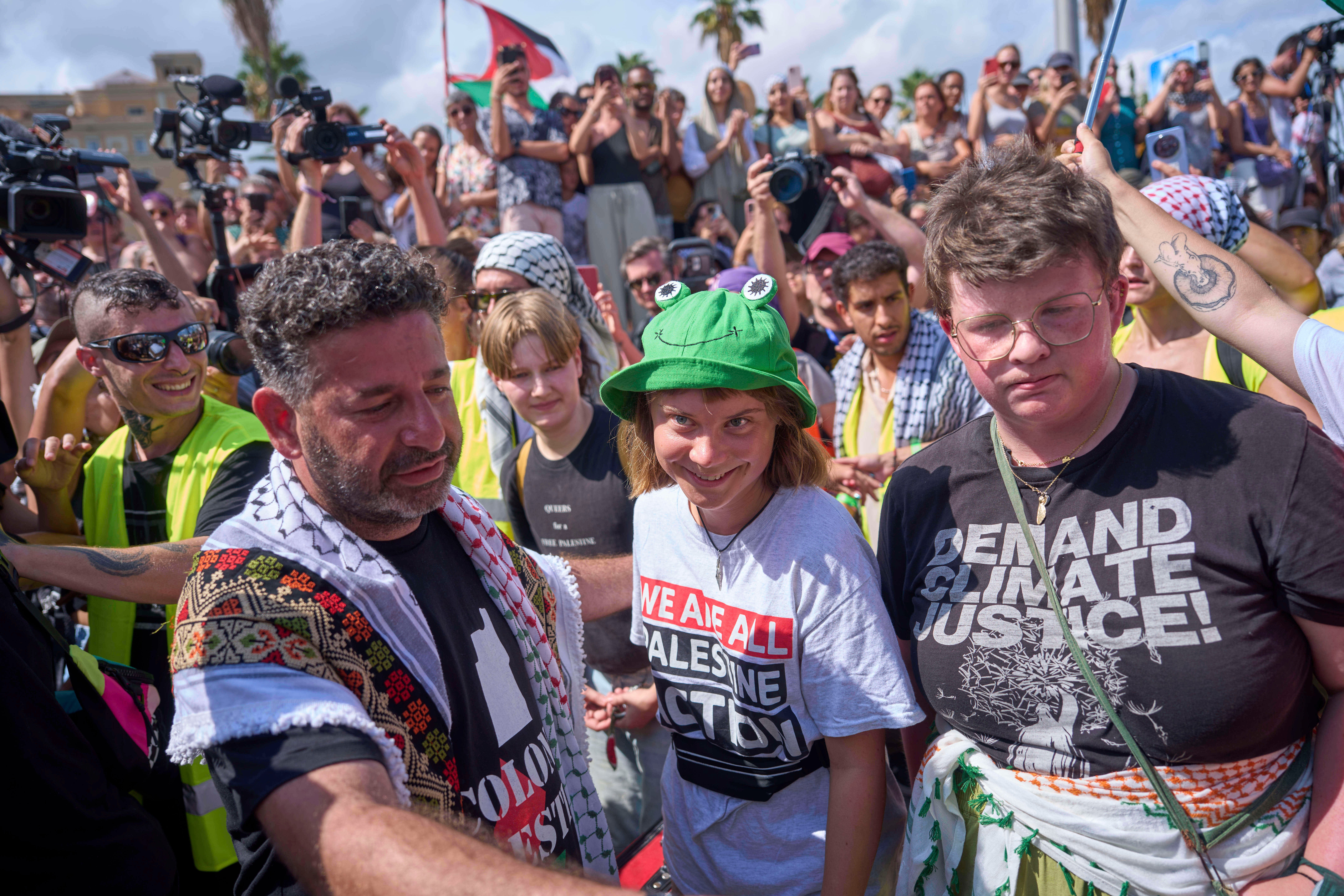 Greta Thunberg prepares to board the boat as it docked in Barcelona
