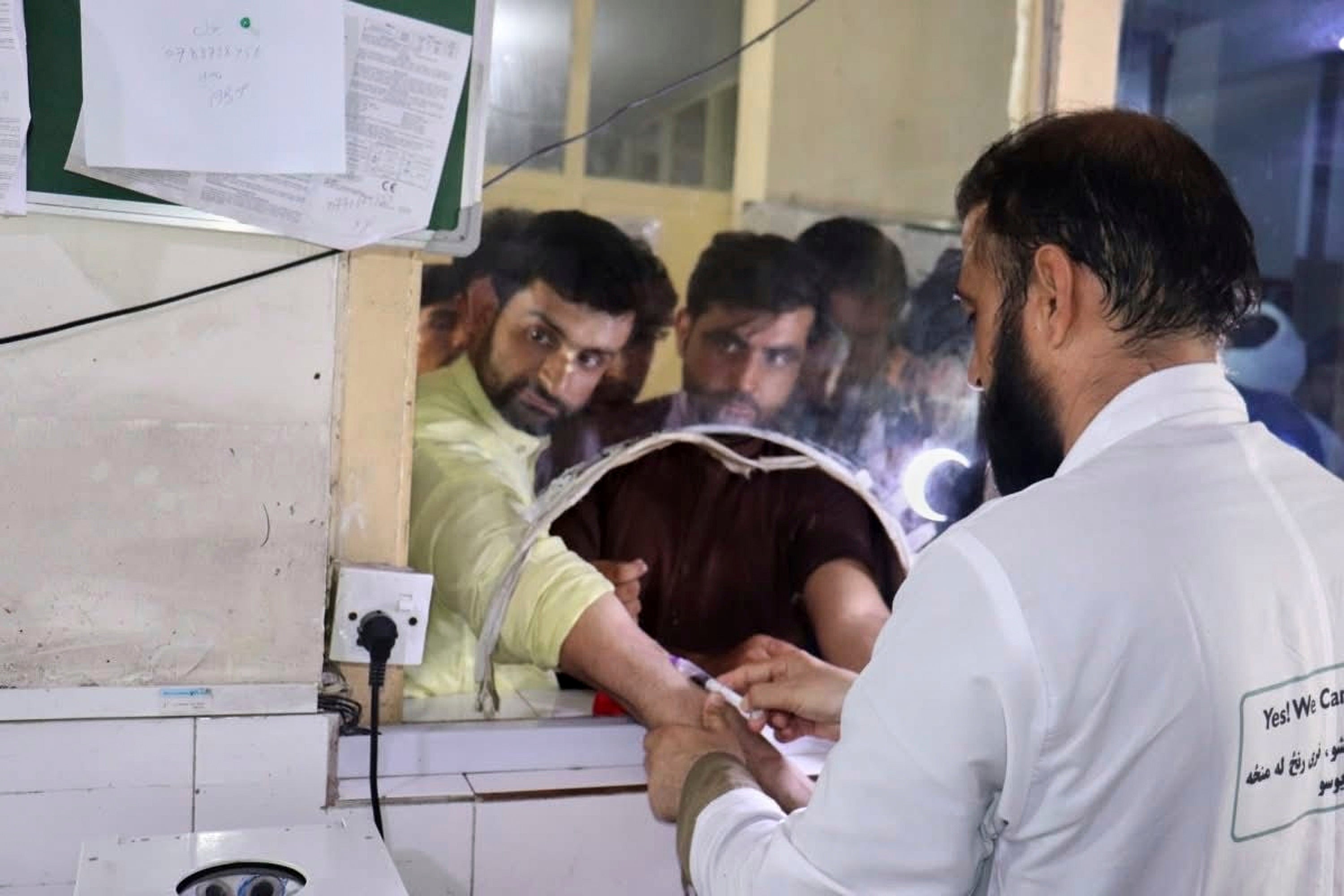 In this photo released by the Ministry of Public Health, Afghans donate blood for victims of an earthquake that killed hundreds and destroyed numerous villages in eastern Afghanistan, at Nangarhar Regional Hospital in Nangarhar, Monday, Sept. 1, 2025
