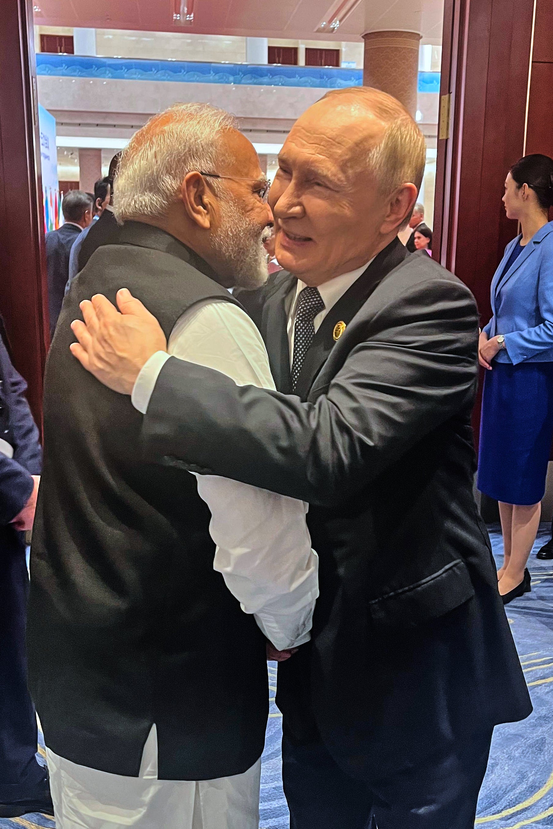 Russian President Vladimir Putin hugs Indian Prime Minister Narendra Modi ahead of the Shanghai Cooperation Organization (SCO) summit at the Meijiang Convention and Exhibition Center in Tianjin, China, Monday, Sept. 1, 2025. (Indian Prime Minister's Office via AP)