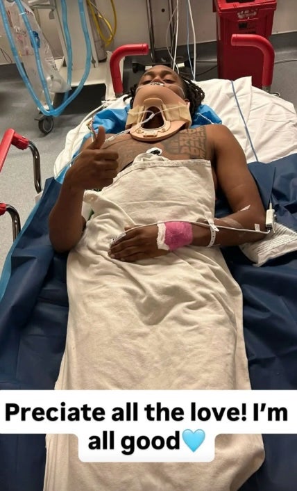 Williams shared a photo online of himself in a neck brace lying down on a stretcher while he gave a thumbs up