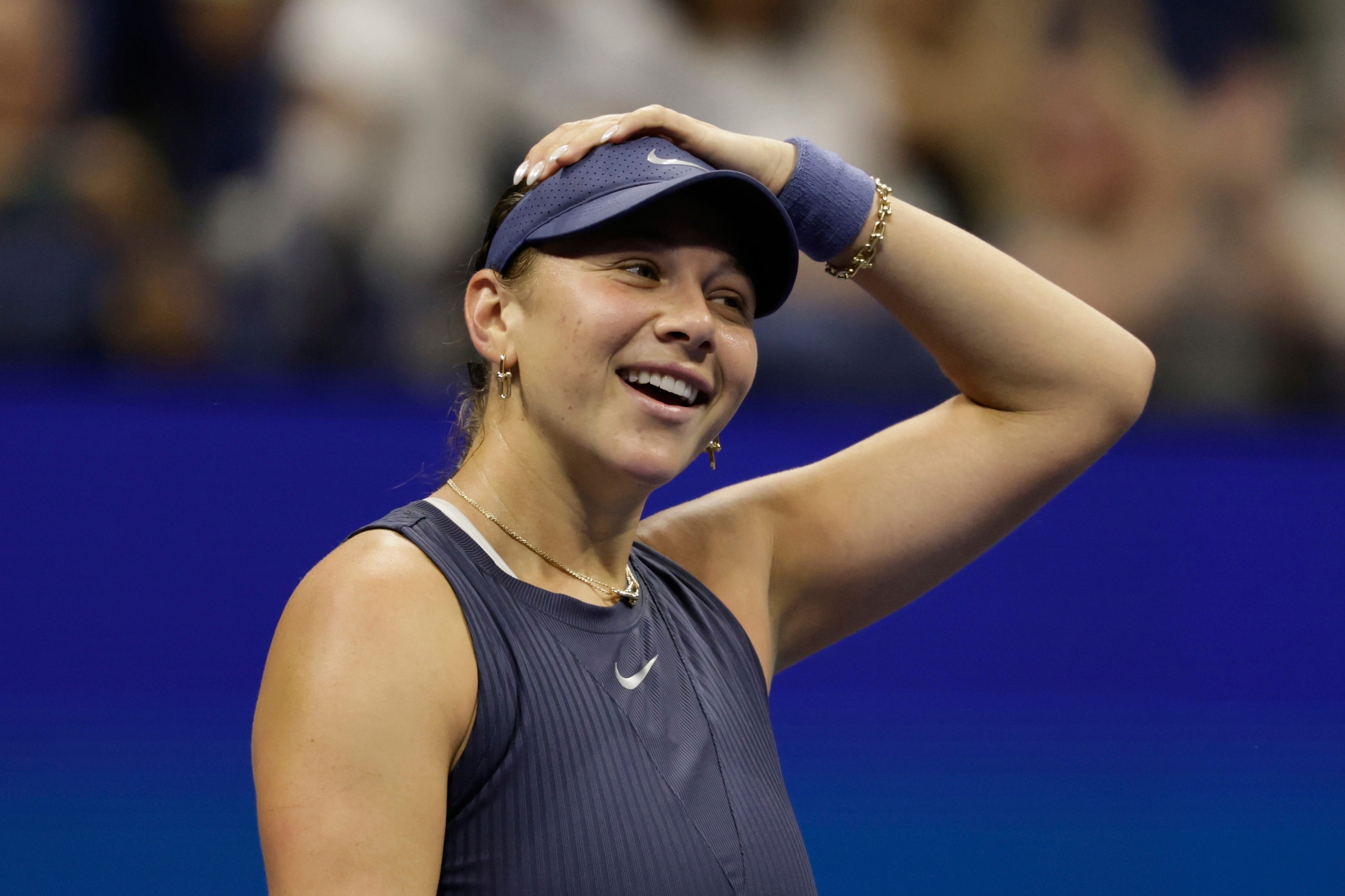 Amanda Anisimova reacts after beating Beatriz Haddad Maia (Adam Hunger/AP)