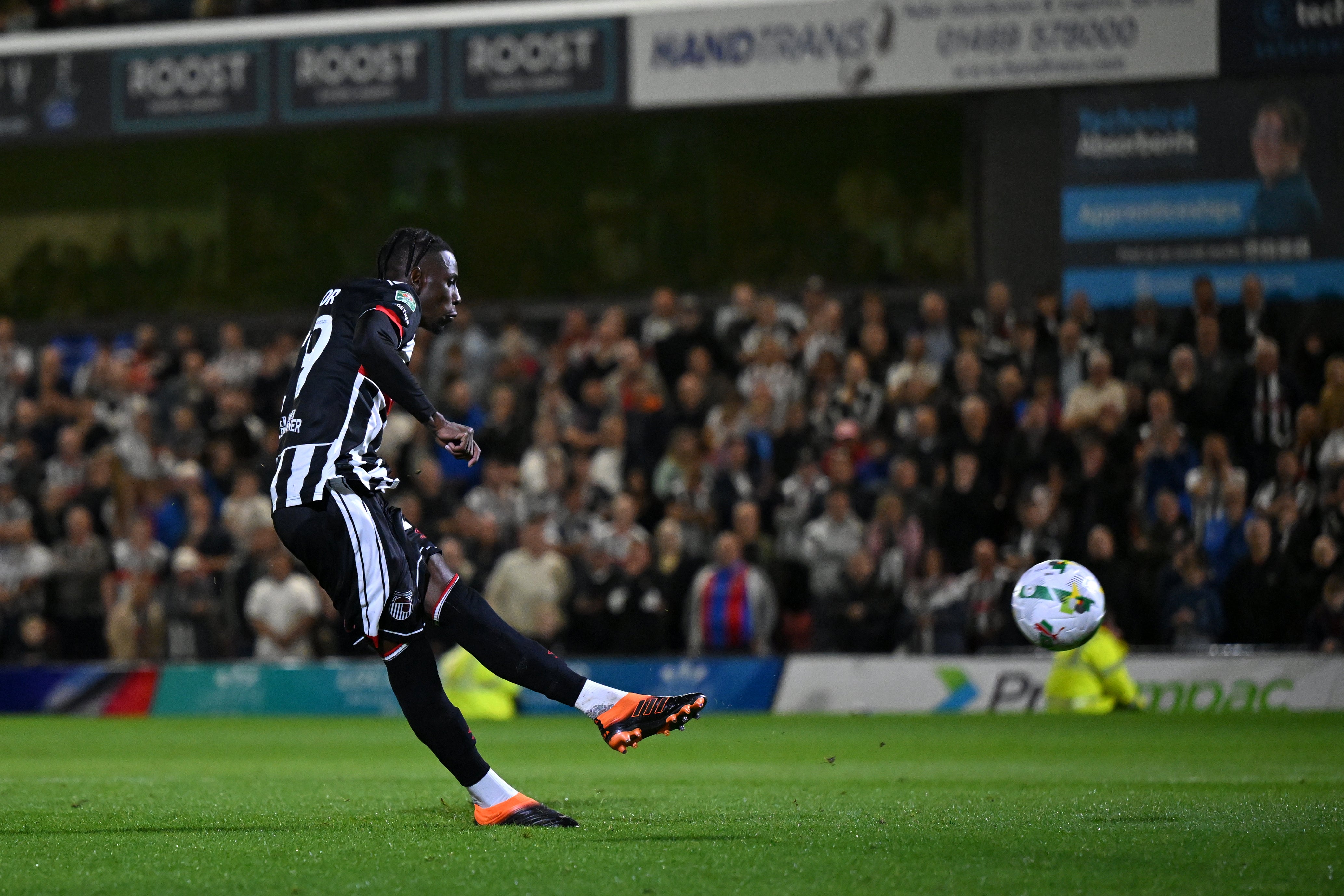 Clarke Oduor missed from the penalty spot in the shootout at Blundell Park