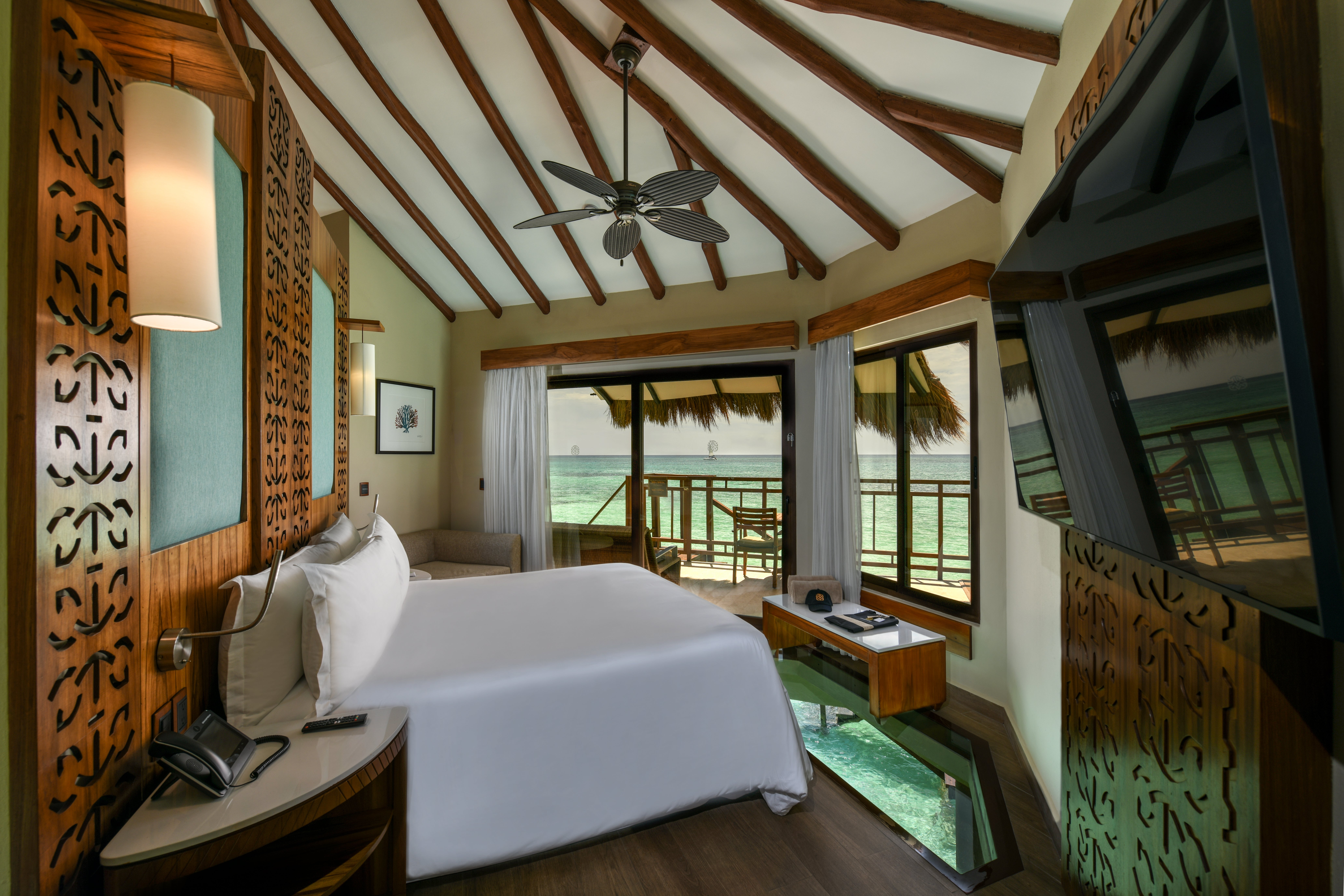 Get up close to nature at Palafitos Overwater Bungalows