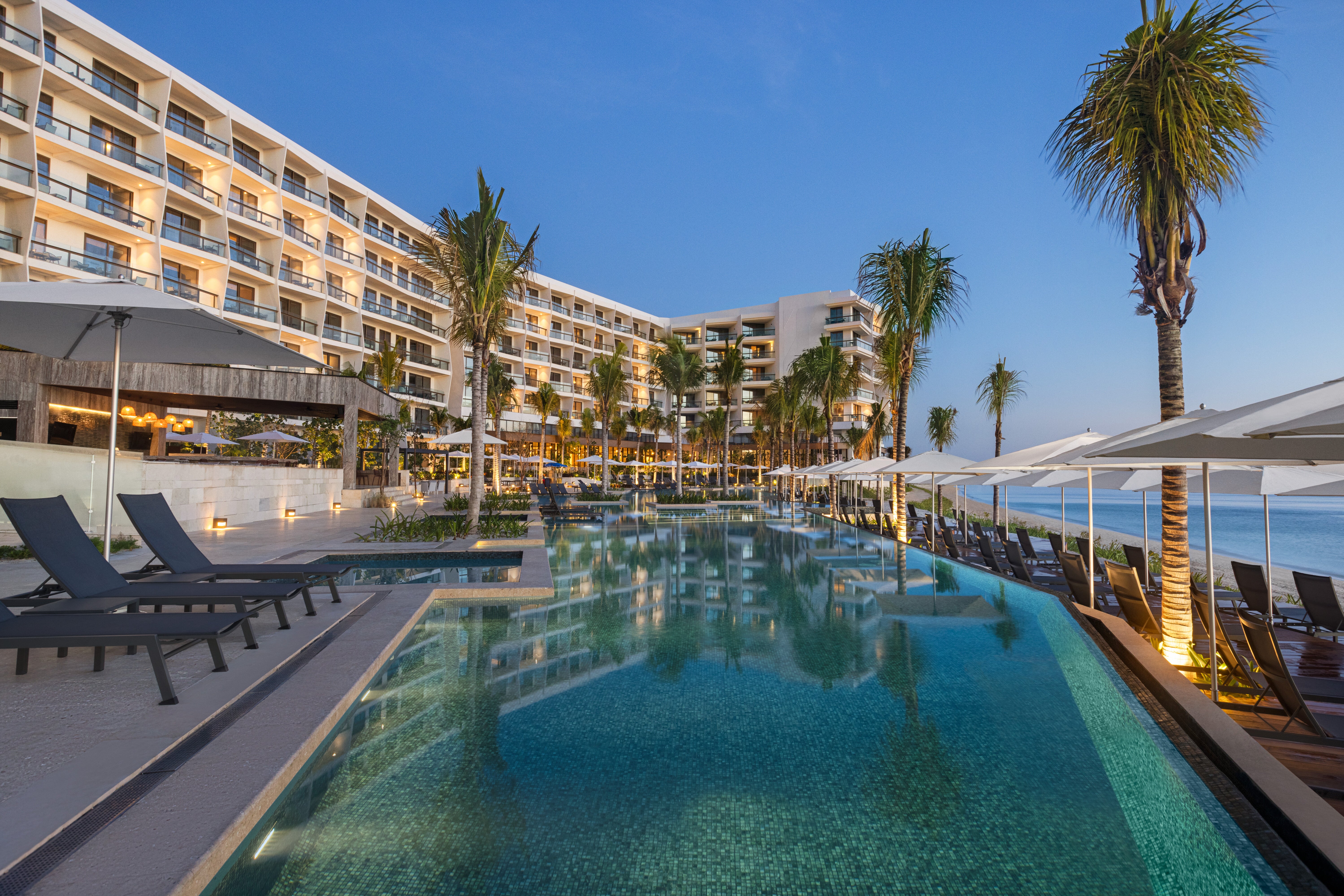 Hidden behind a mangrove preserve, Hilton Cancun, an All-Inclusive Resort, makes the ultimate retreat