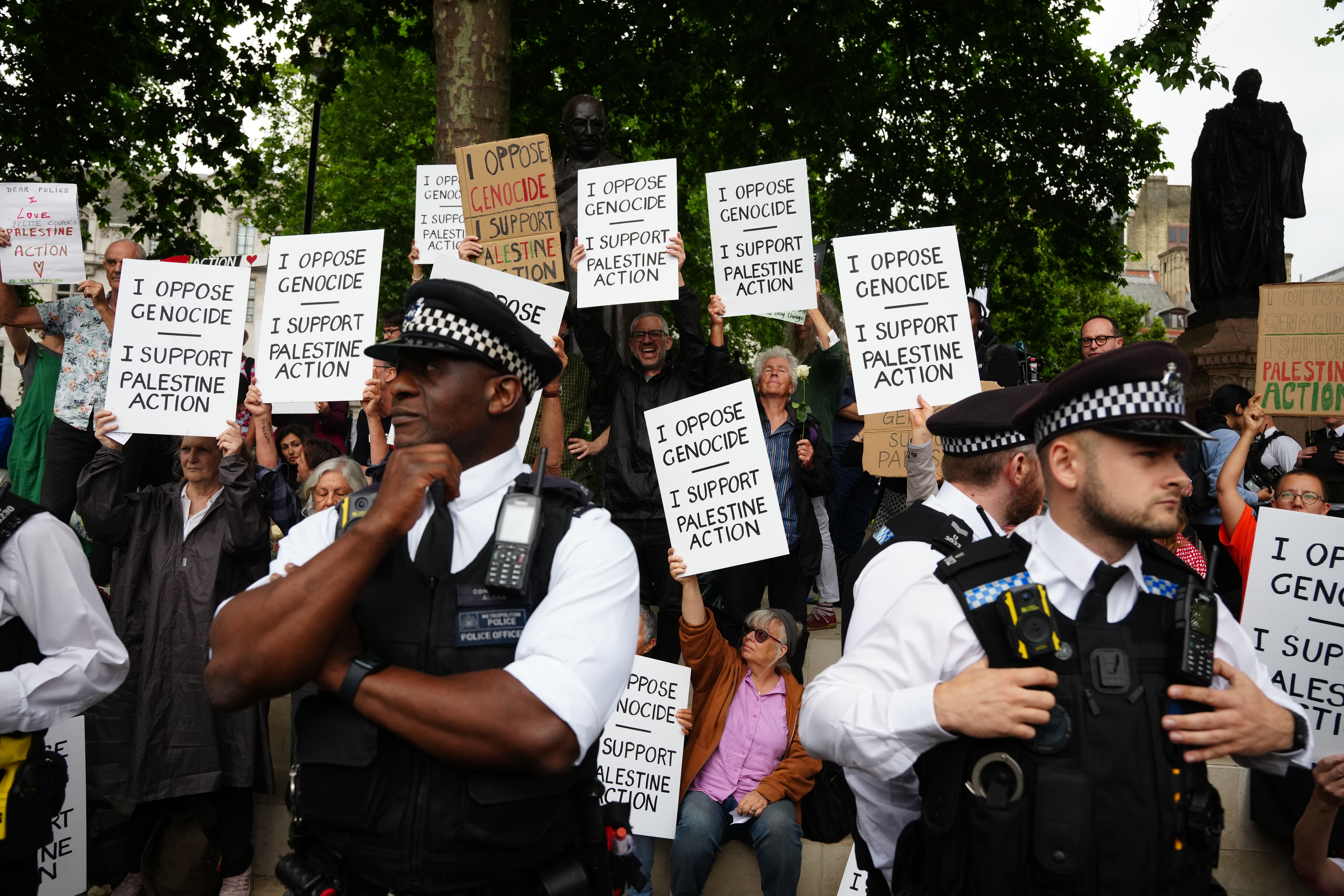 An earlier protest in central London in support of Palestine Action was organised by the Defend Our Juries group (Jeff Moore/PA)