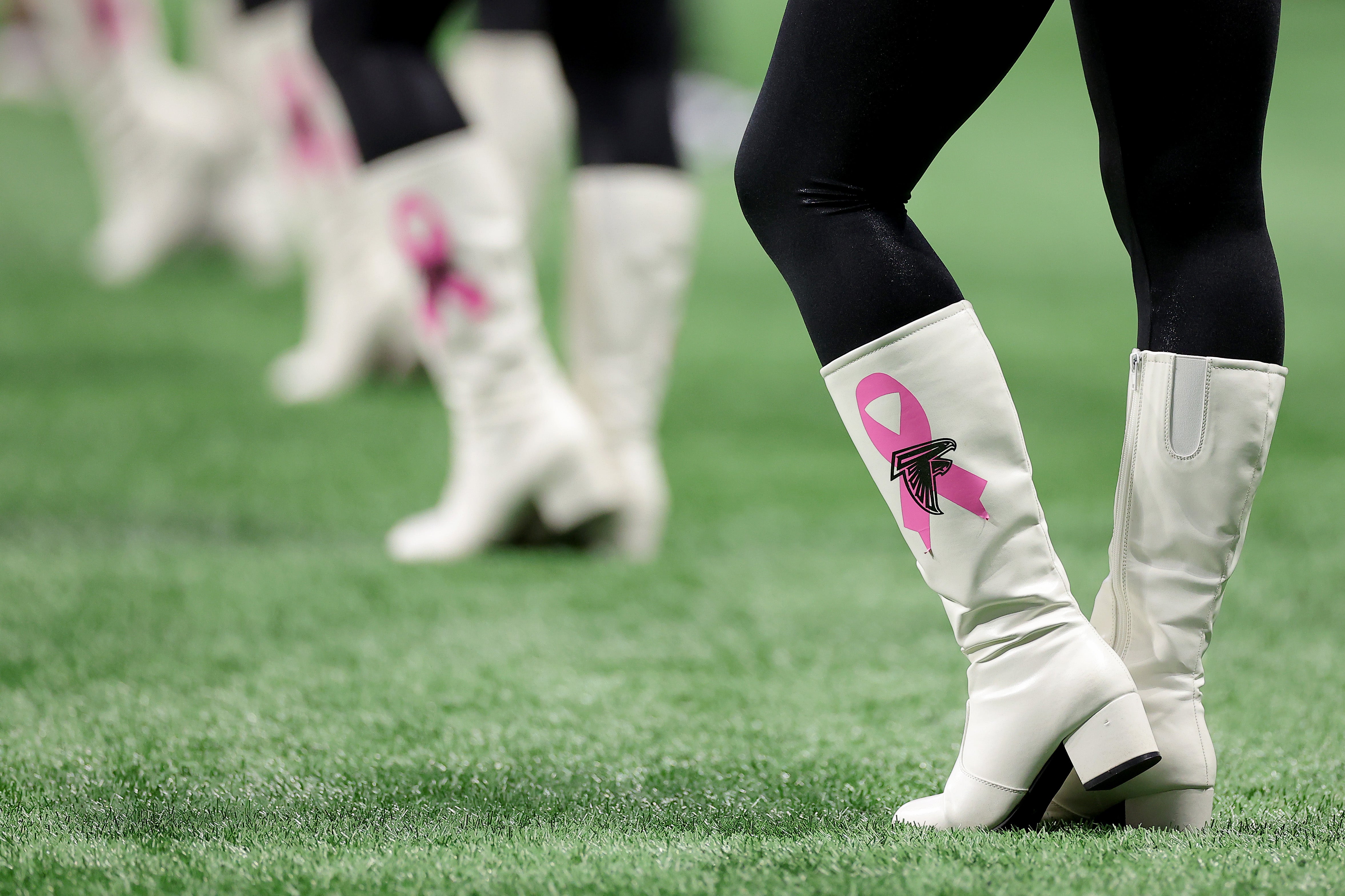 The Breast Cancer Awareness ribbon is seen on the boots of the Atlanta Falcons cheerleaders during a game last September in Atlanta, Georgia. This year, an estimated 319,750 people will be diagnosed with the disease