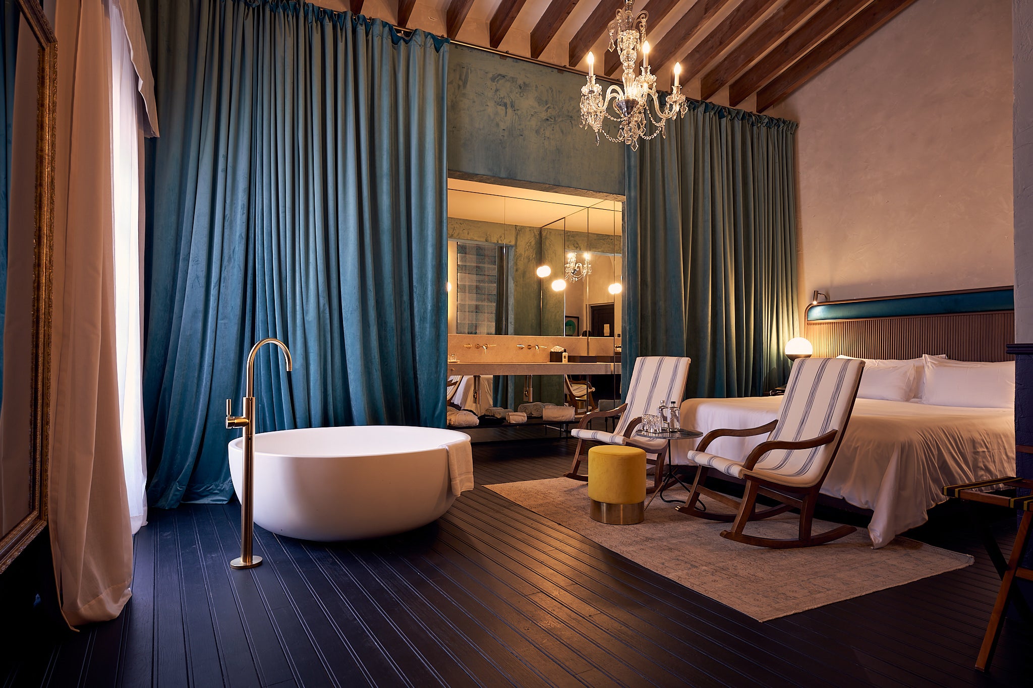 Thick velvet curtains and freestanding bathtubs can be found at Can Bordoy