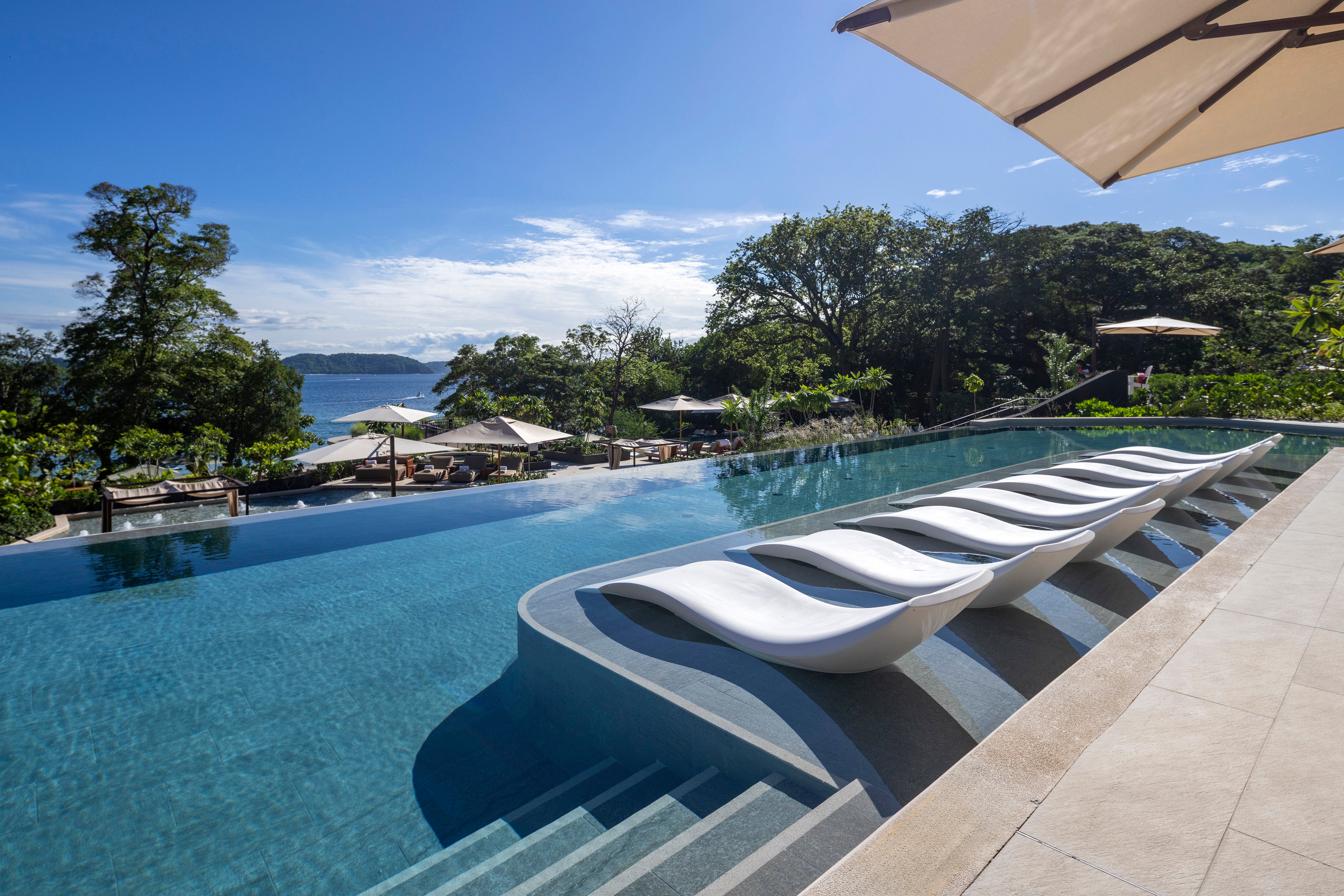 10 swimming pools are spread over multiple cascading levels at Waldorf Astoria Punta Cacique, Costa Rica