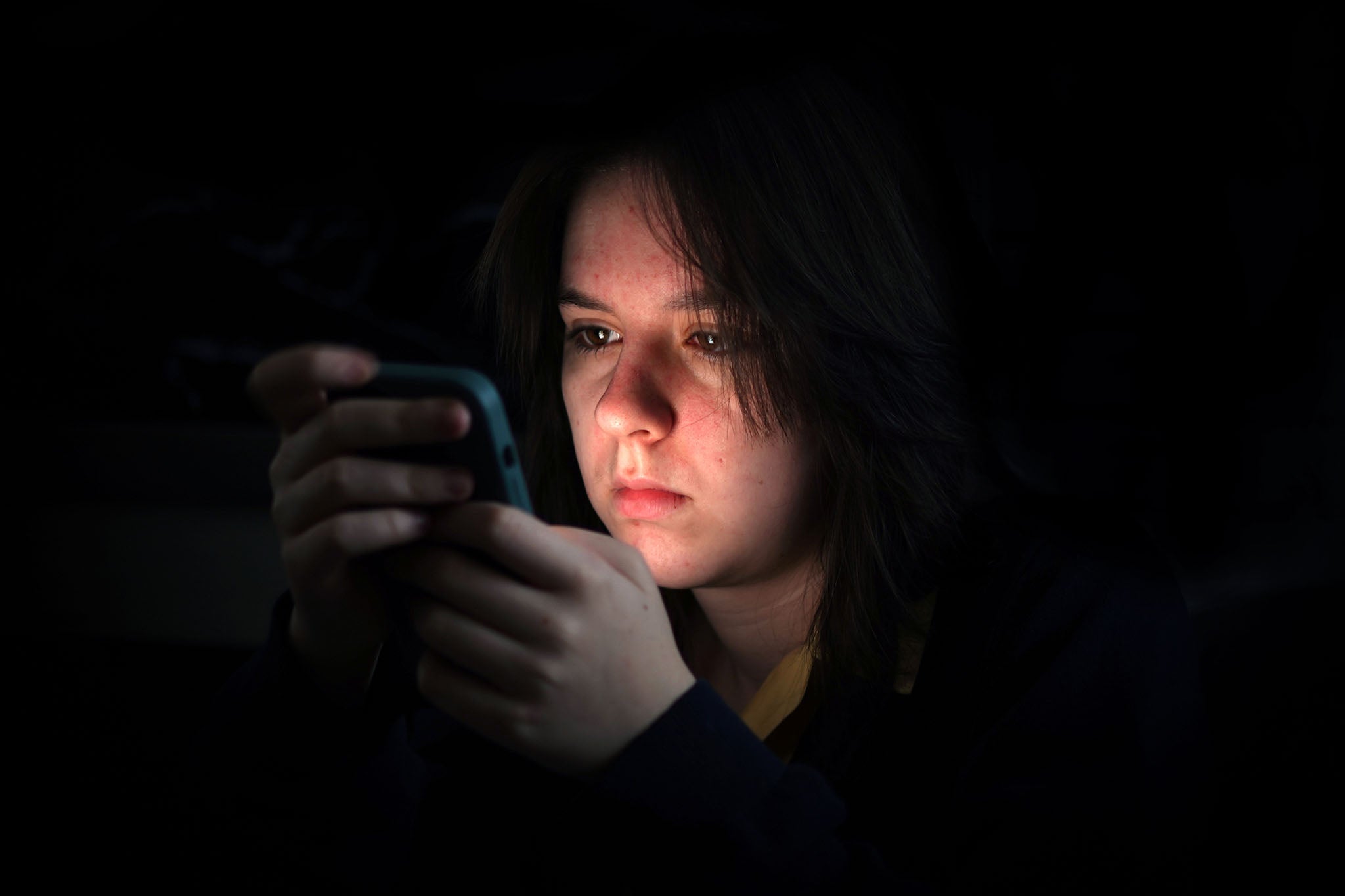 A child using a mobile phone