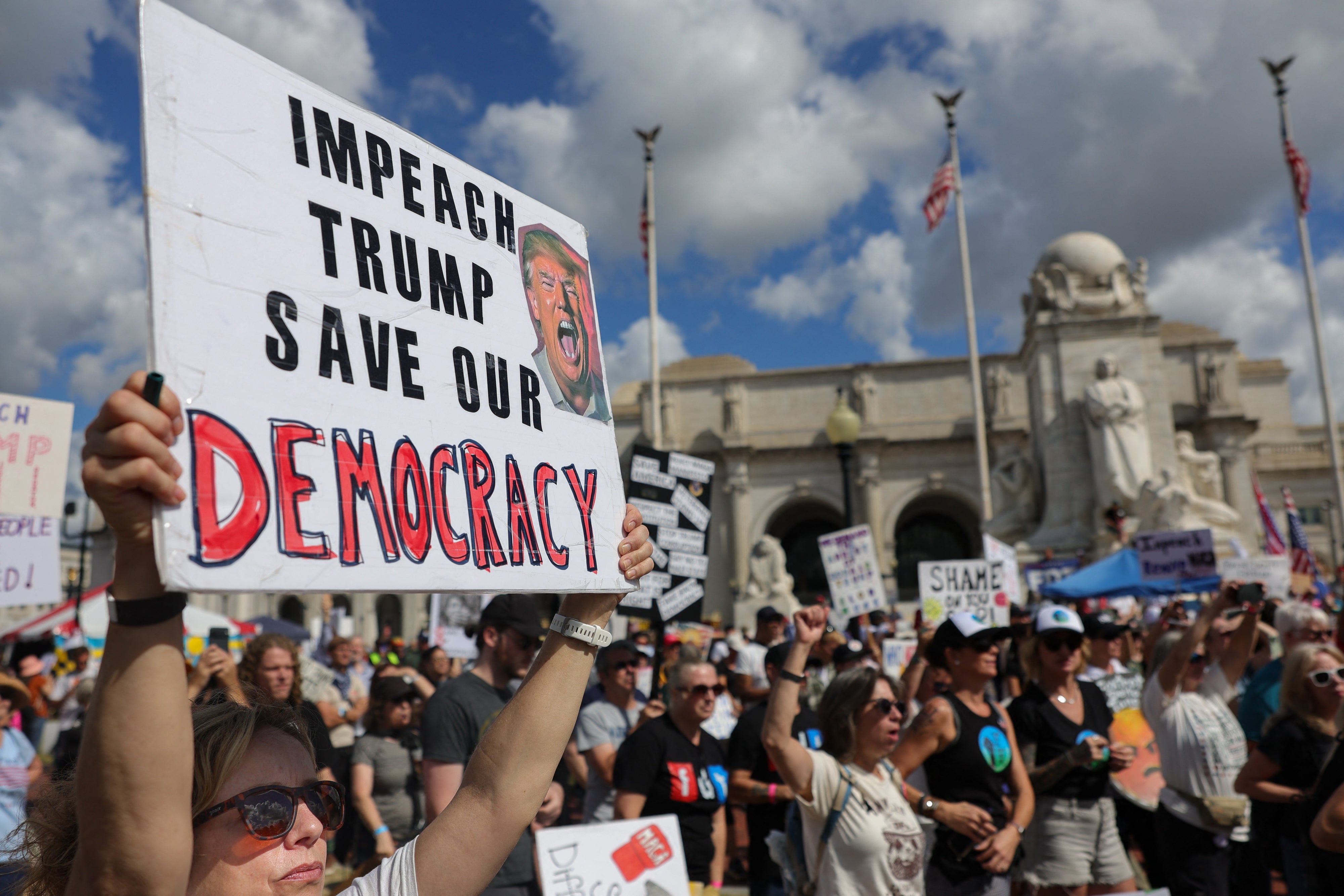 Demonstrators gather at Union Station for an anti-Trump protest