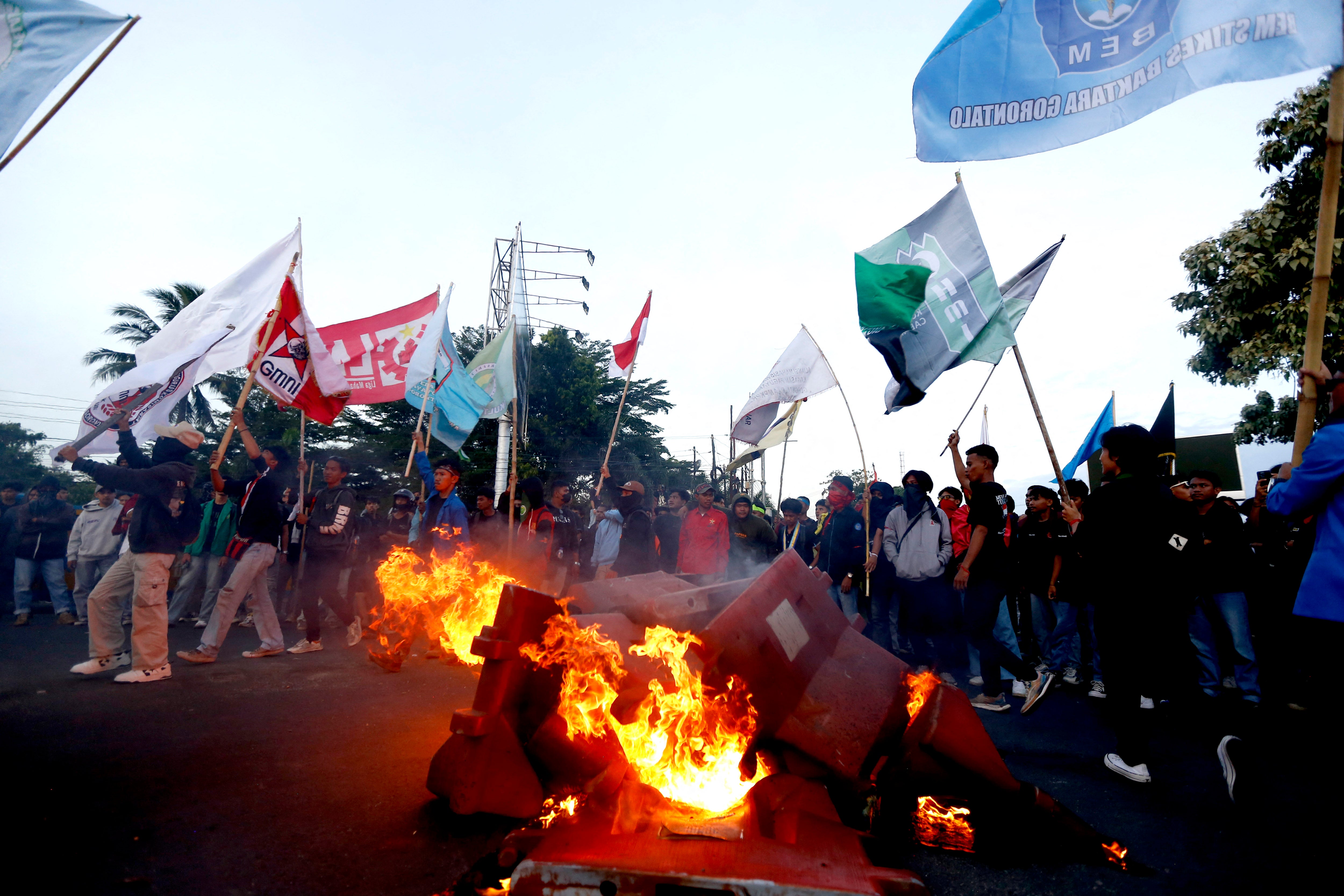 Protesters take part in a demonstration against politicians’ allowances in Gorontalo, Sulawesi
