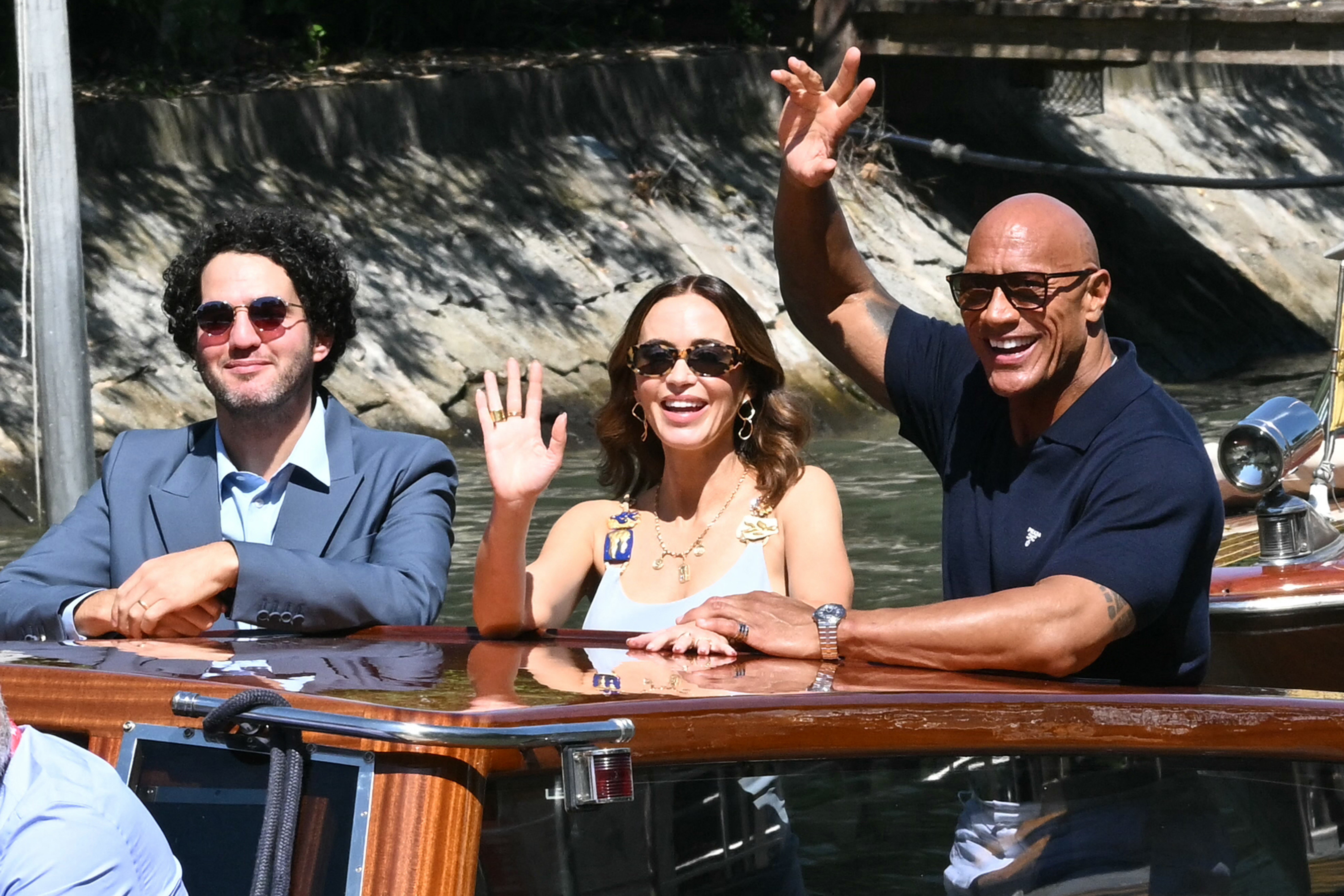Benny Safdie, Emily Blunt and Dwayne Johnson arrive at the 82nd Venice International Film Festival