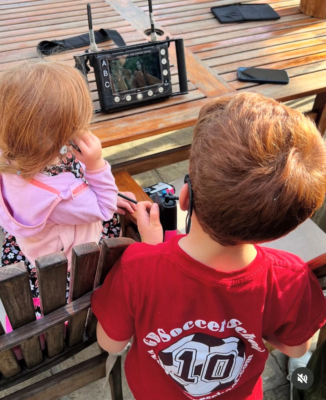 The Duchess of Sussex shared pictures of Archie, six, and Lilibet, four, watching her film the series