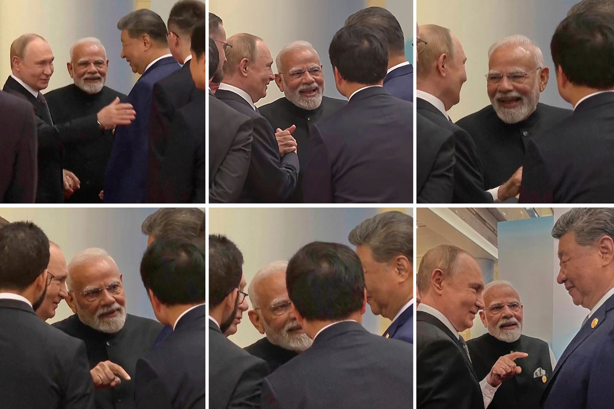 Vladimir Putin, left, Indian prime minister Narendra Modi, centre, and Chinese president Xi Jinping talk ahead of the Shanghai Cooperation Organisation summit in China