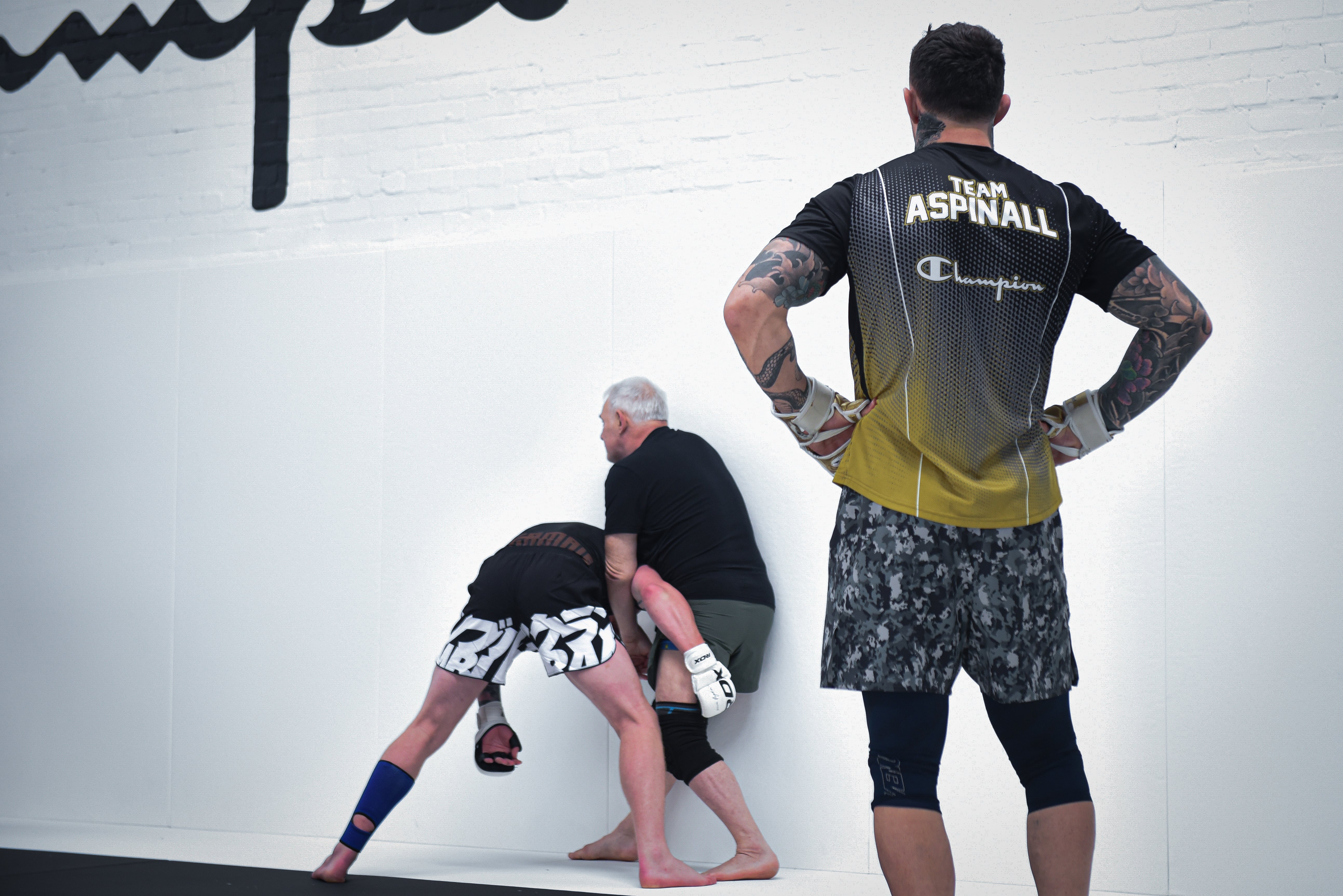 Tom watches his father Andy demonstrating a technique