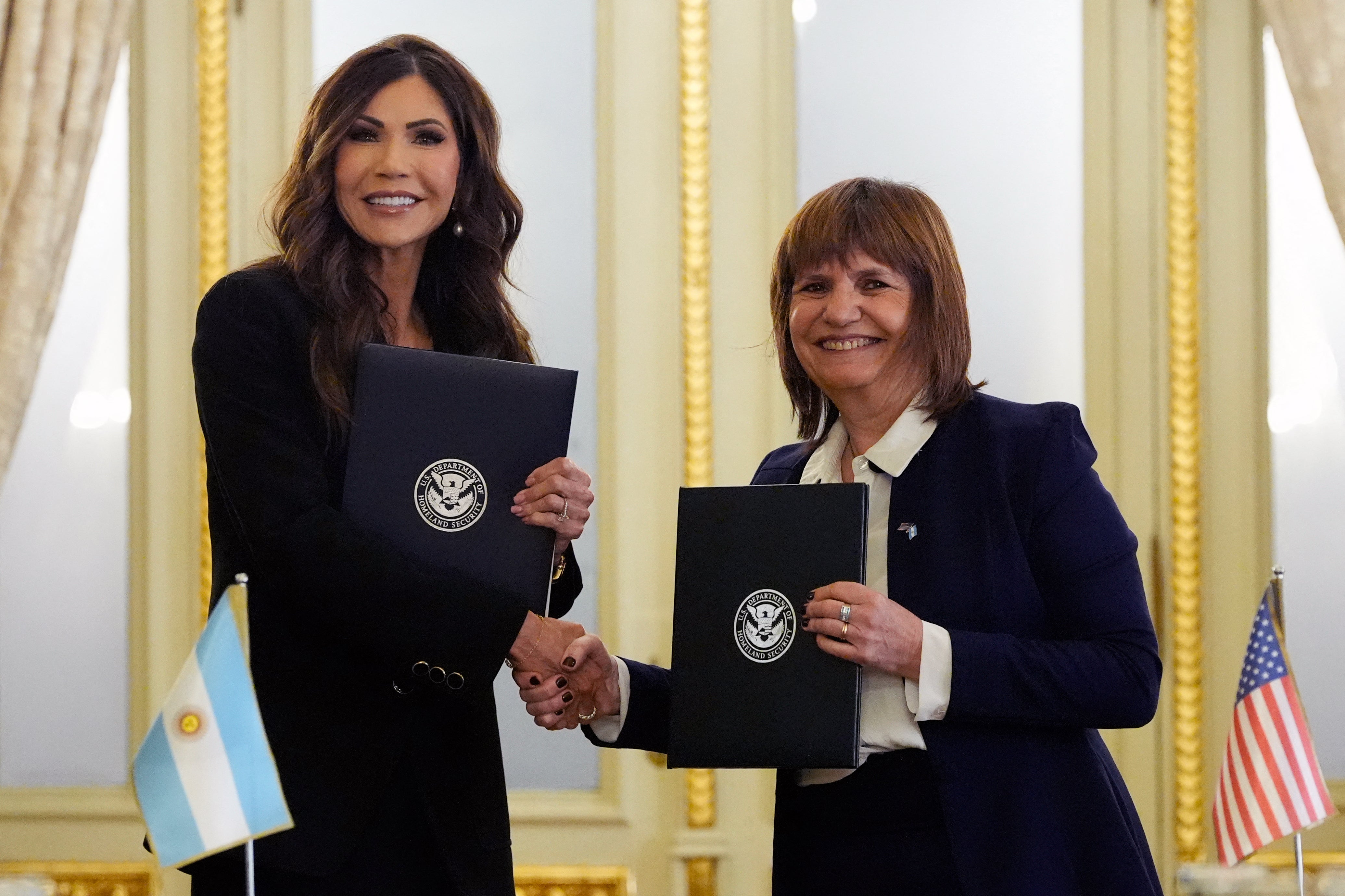 Homeland Security Secretary Kristi Noem, pictured with Argentine Minister of National Security Patricia Bullrich in July, reportedly failed to inform a delegation that they were pausing a potential Visa Waiver Program agreement