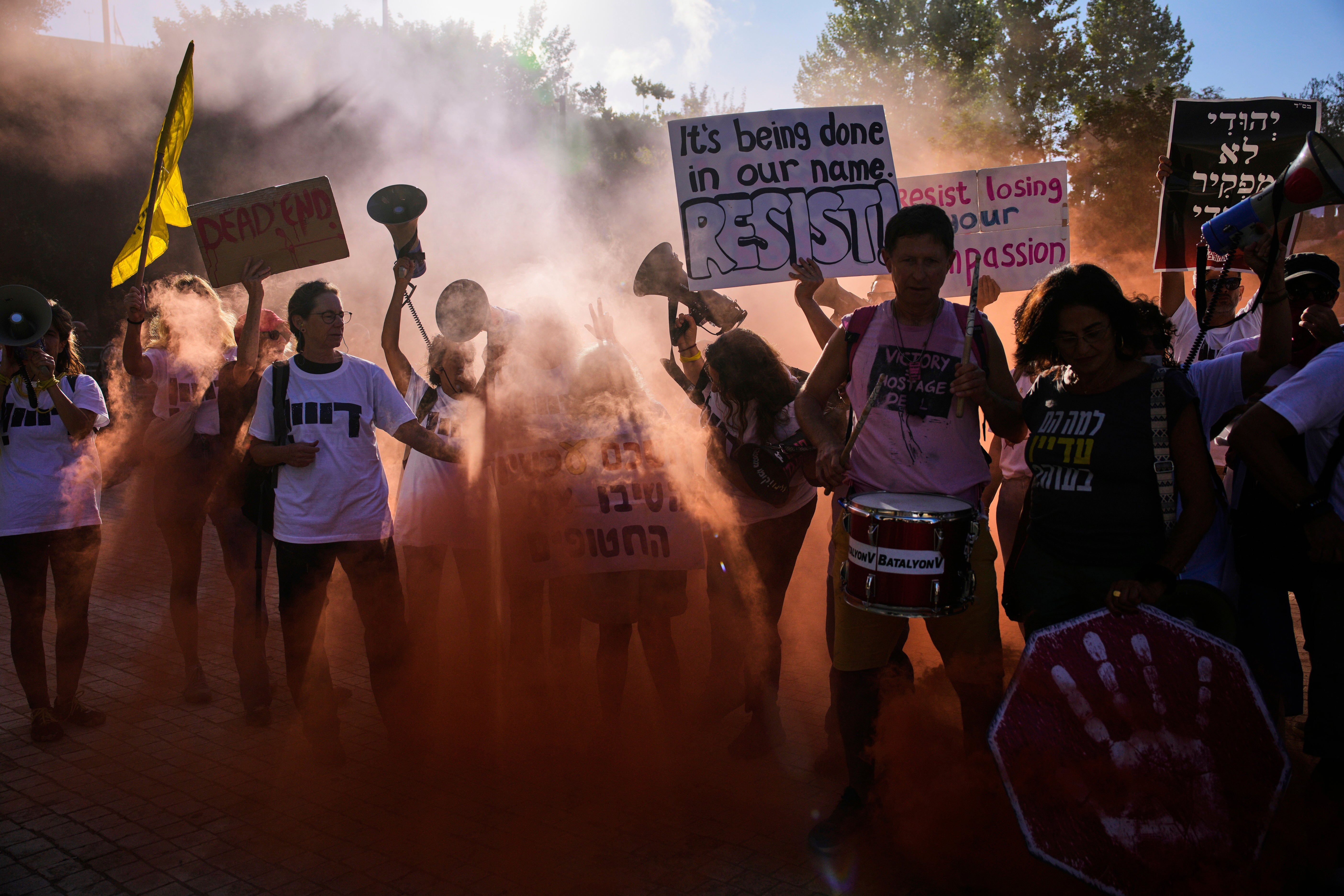Demonstrators wave signs and shout slogans calling for the end of the war in the Gaza Strip, in Jerusalem, Wednesday, 3 September 2025. (AP Photo/Ohad Zwigenberg)