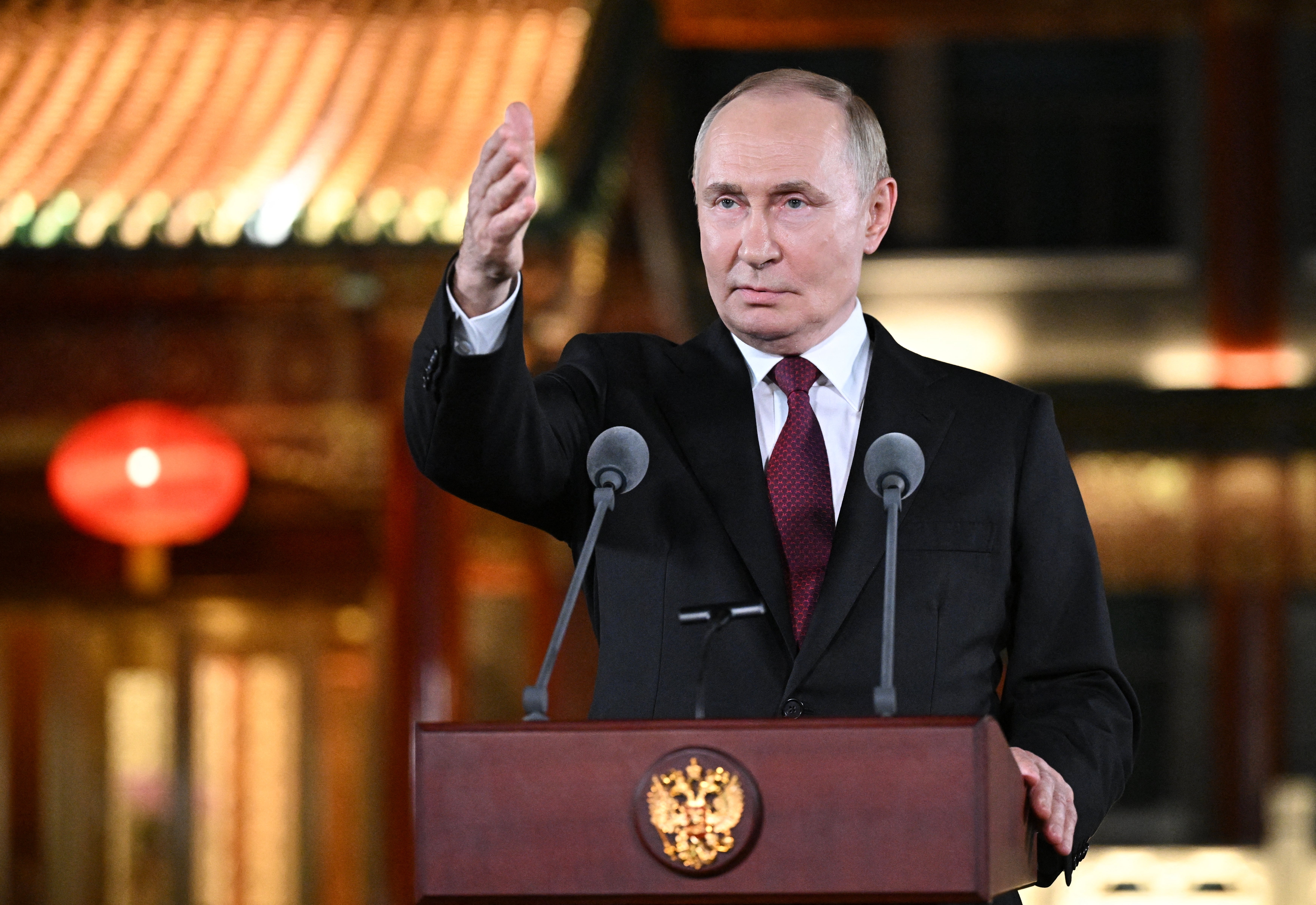 Russia's president Vladimir Putin holds a press conference, at the end of his visit to China for the Tianjin SCO Summit