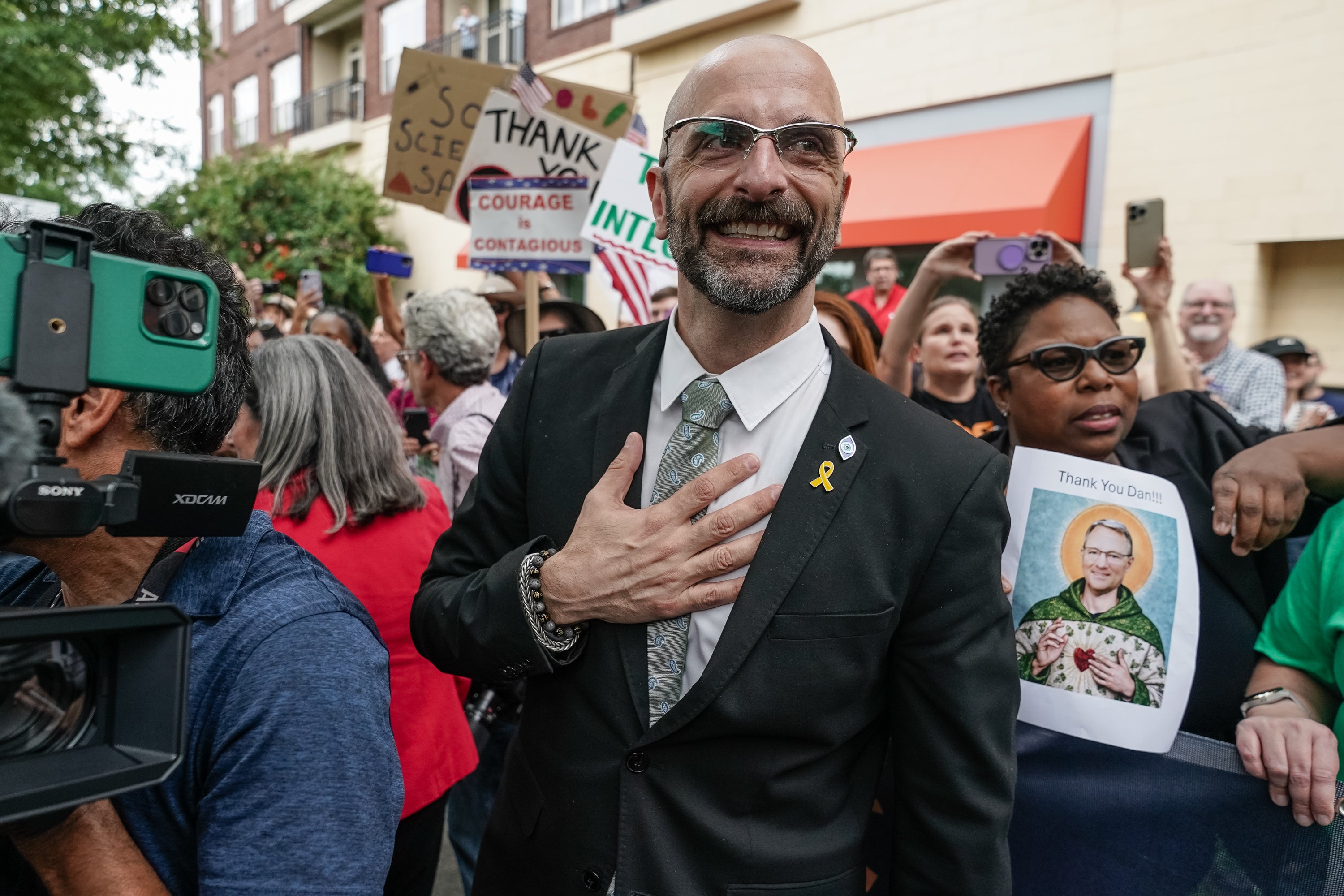 Demetre Daskalakis gestures as employees and CDC supporters gather to support him and other agency leaders who resigned last week