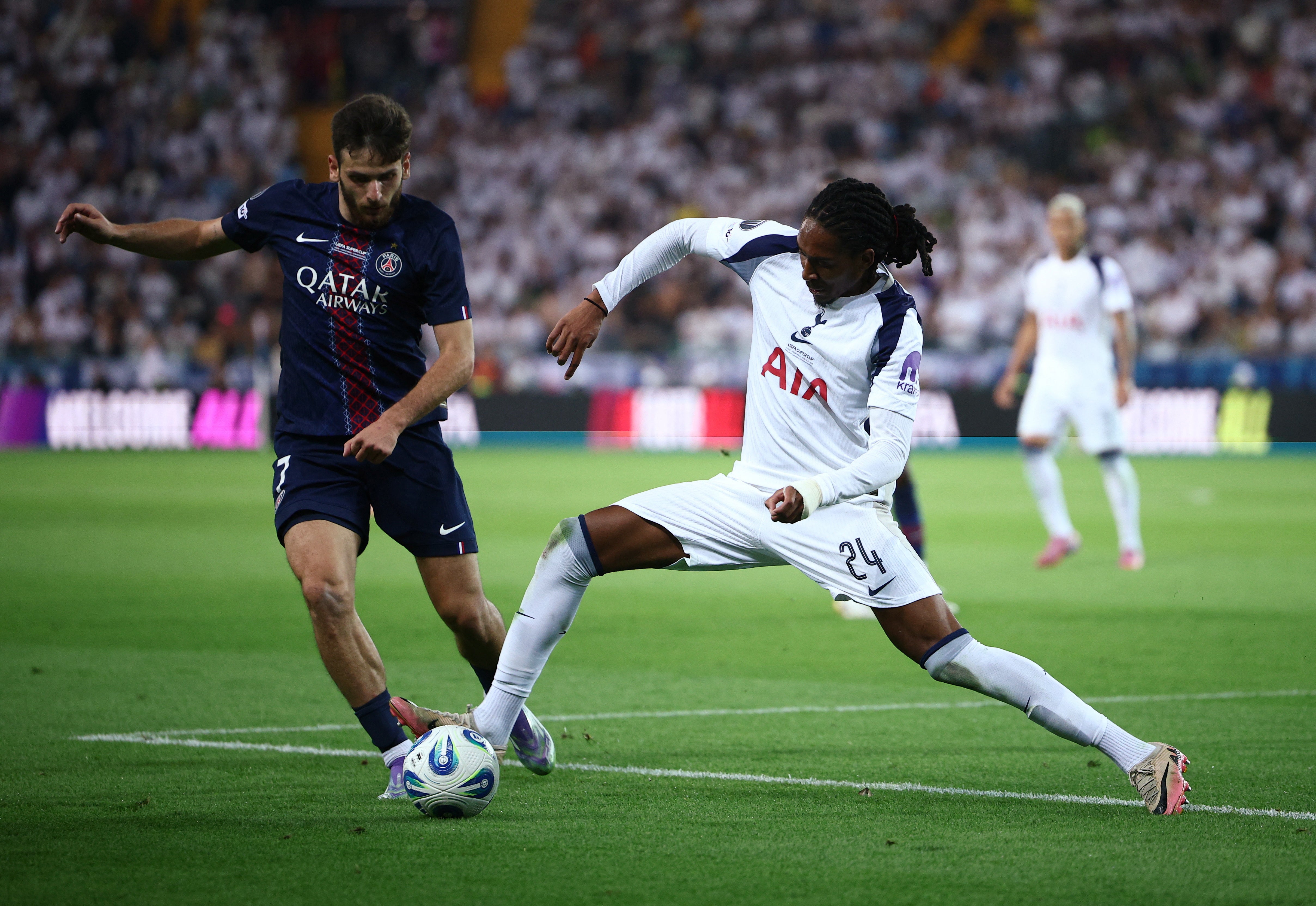 Djed Spence battles for the ball with Paris Saint-Germain’s Khvicha Kvaratskhelia in the Super Cup