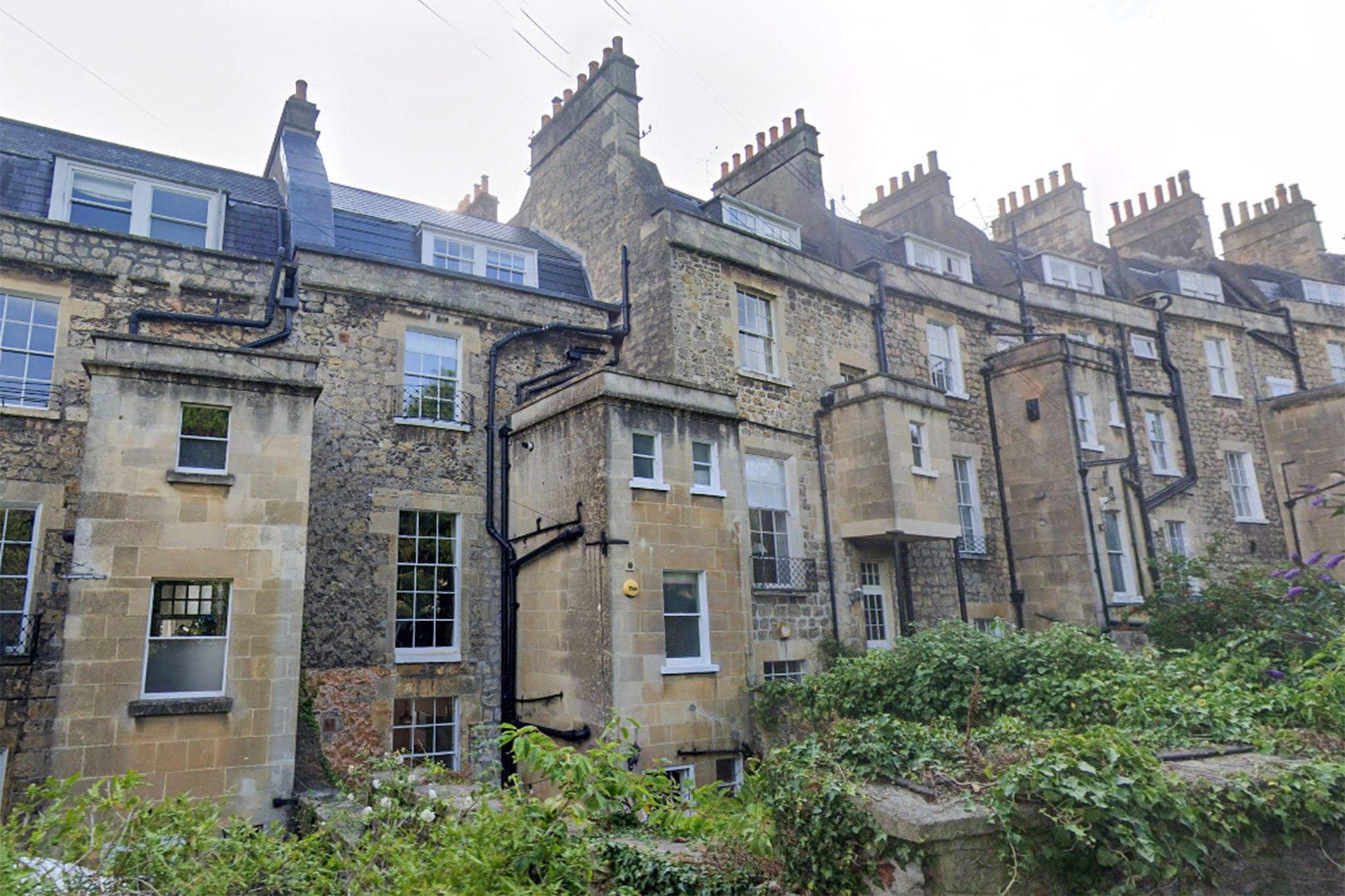 Police found Delia Haxworth, 85, ‘lifeless’ on a bed at the couple’s home on Upper Lansdown Mews