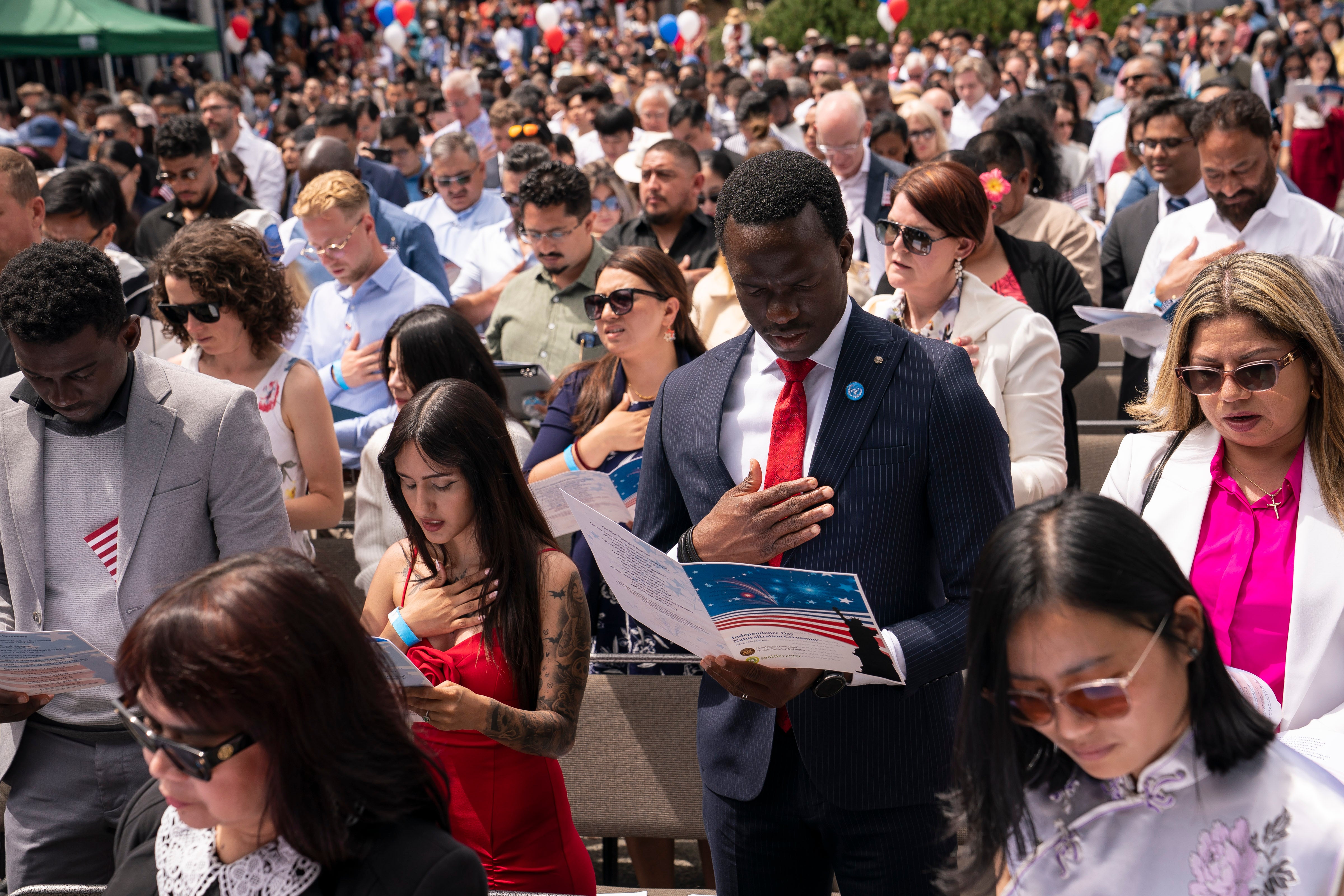 The Trump administration has been accused of launching an 'attack' on immigrants after banning voter recruitment drives at naturalization events