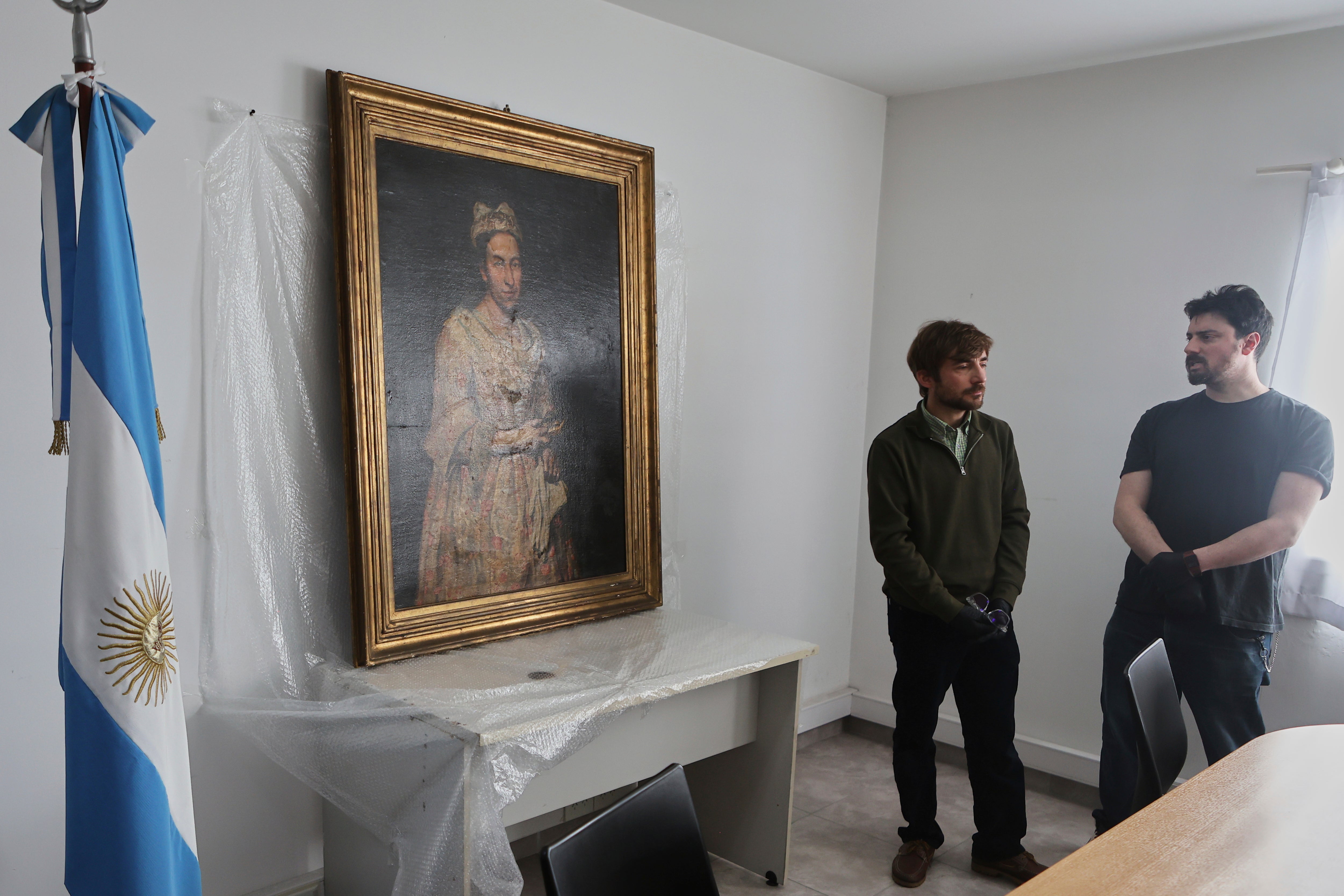 The Ghislandi painting is displayed during a press conference