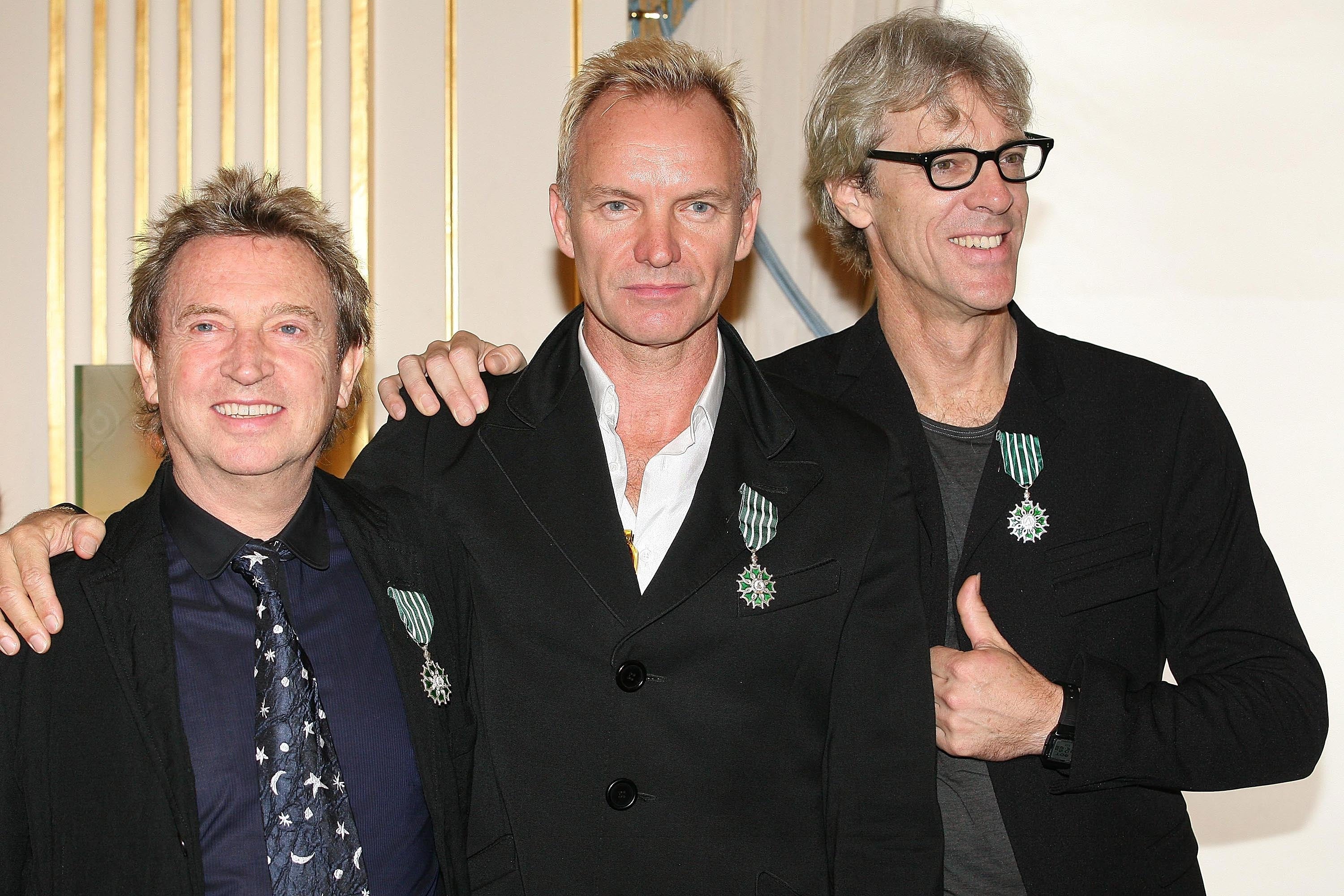Andy Summers, Sting and Stewart Copeland of The Police after being inducted as 'Knights in the Order of Arts and Letters' in 2007
