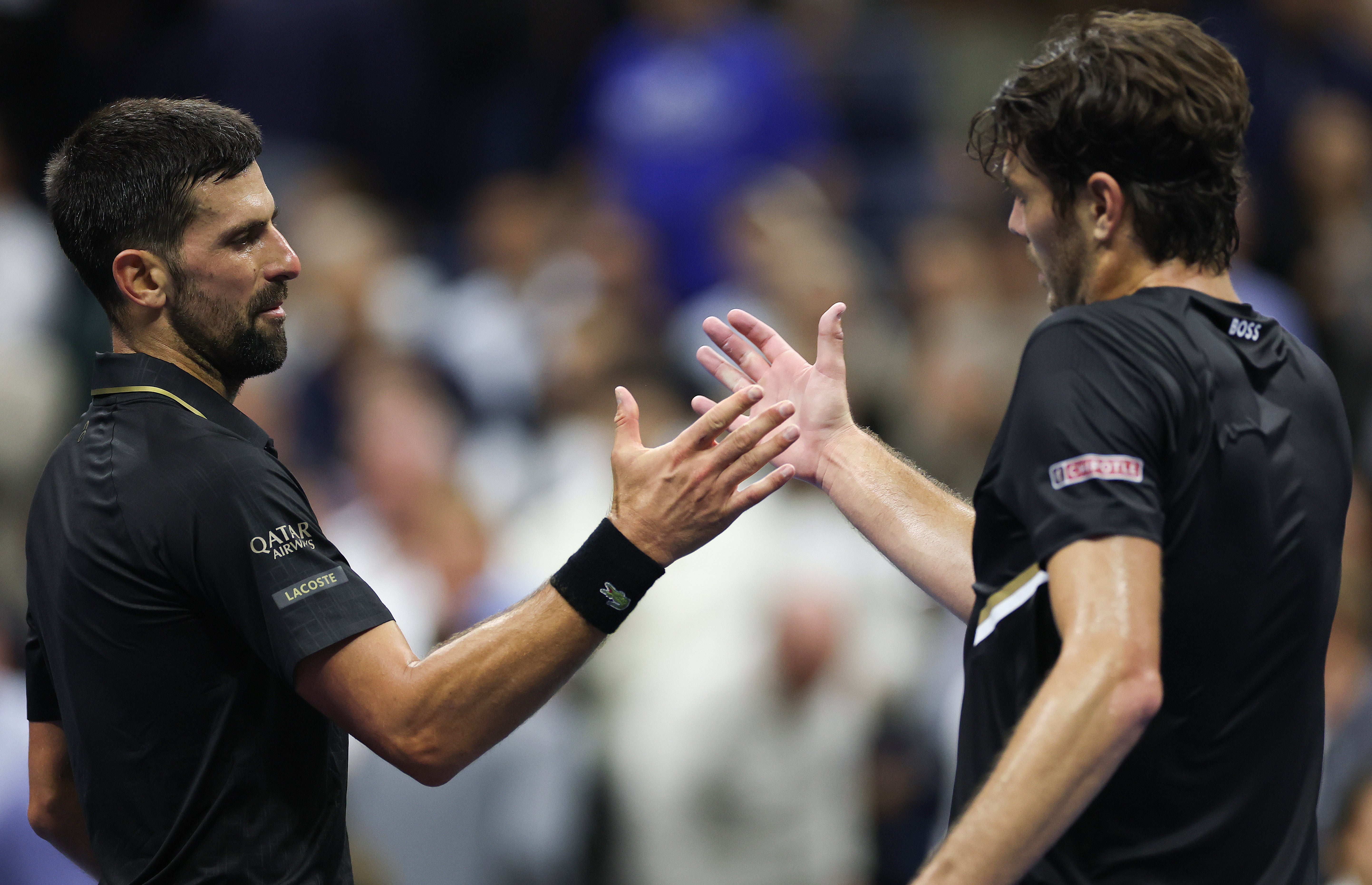 Djokovic survived in four sets to set up a clash with Carlos Alcaraz