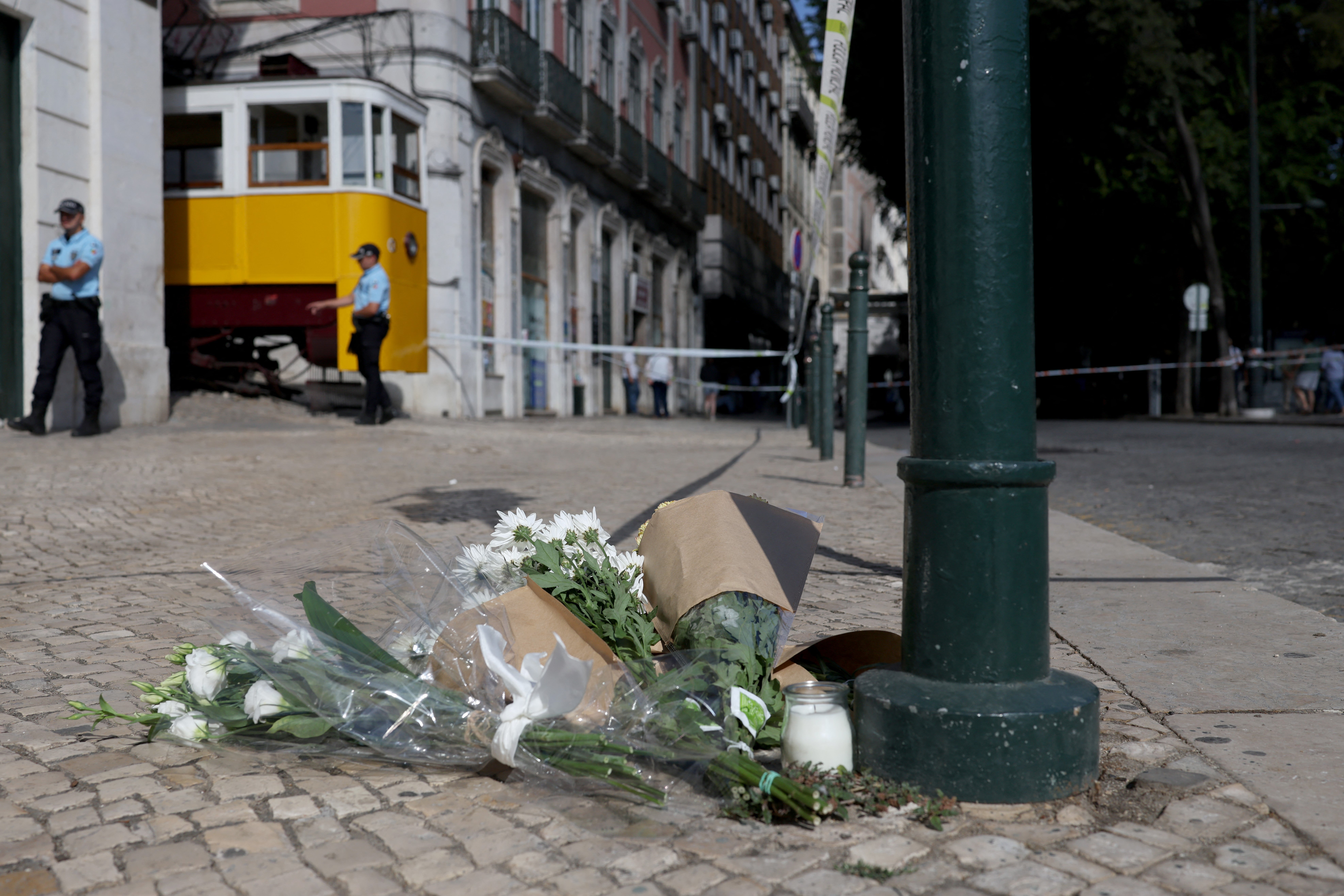 Flowers left in tribute to the victims of the crash in Lisbon
