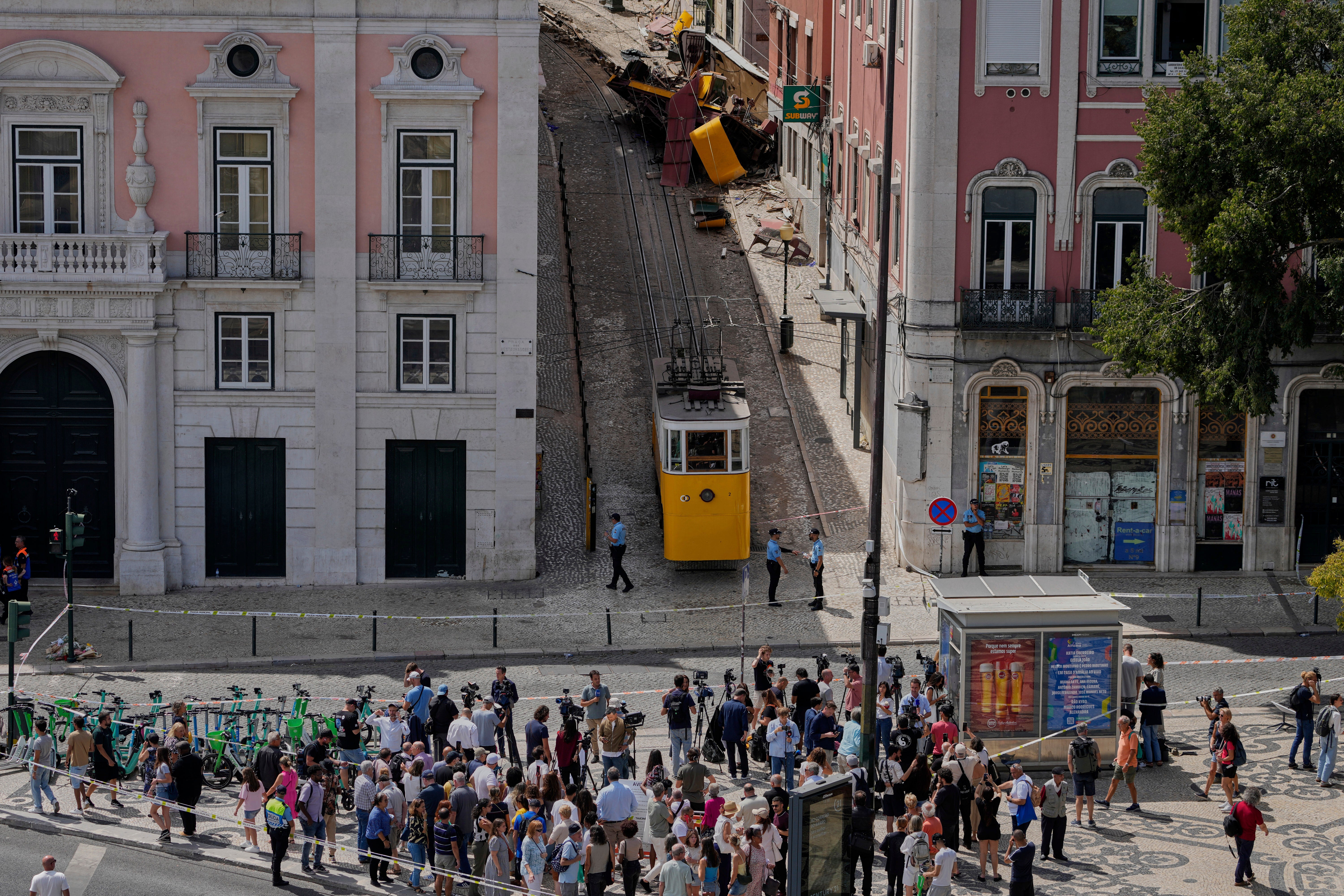Locals gather in Lisbon after the funicular derailed