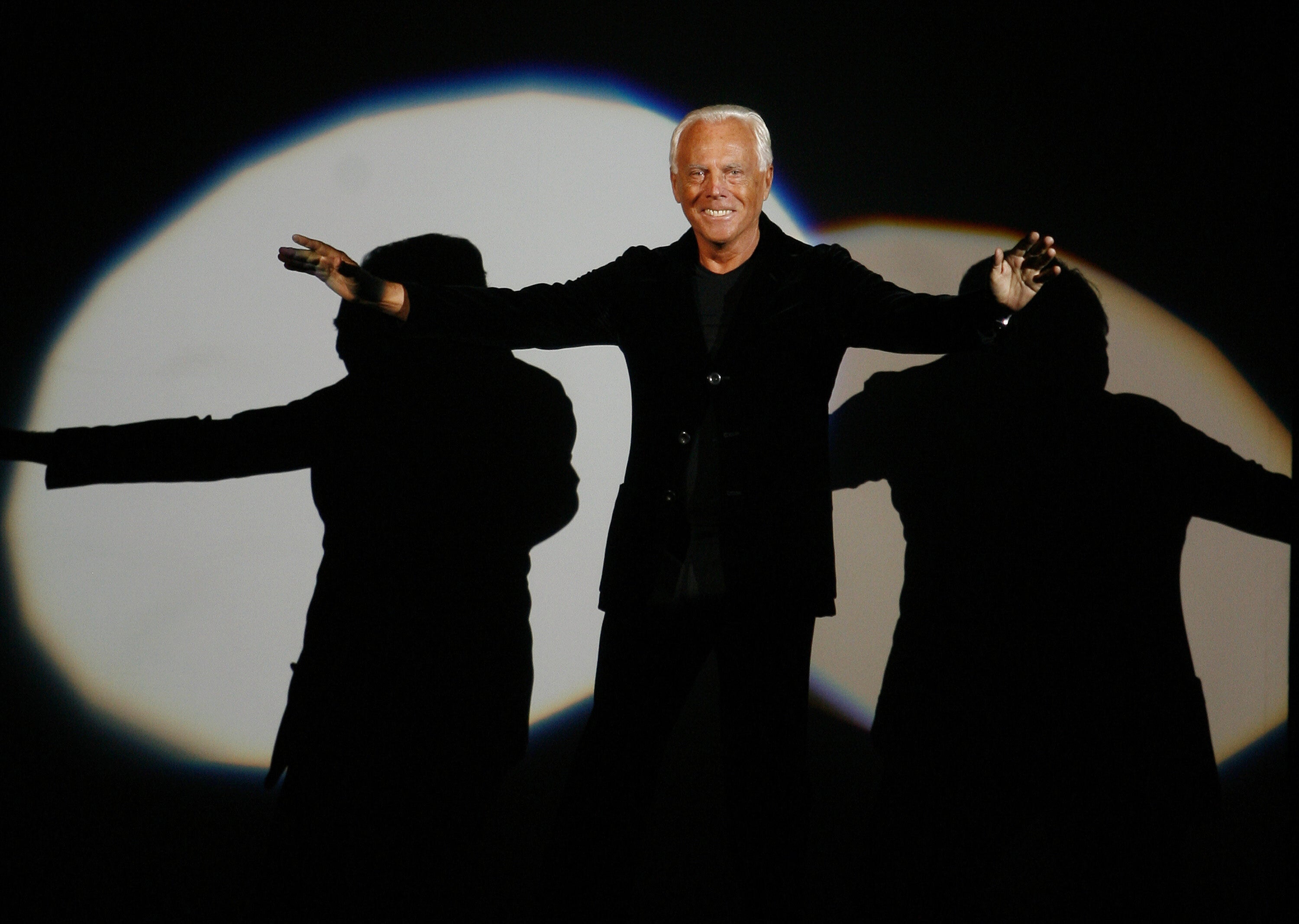 Giorgio Armani receives his share of applause after presenting his Emporio Fall-Winter 2007-2008 men’s fashion collection