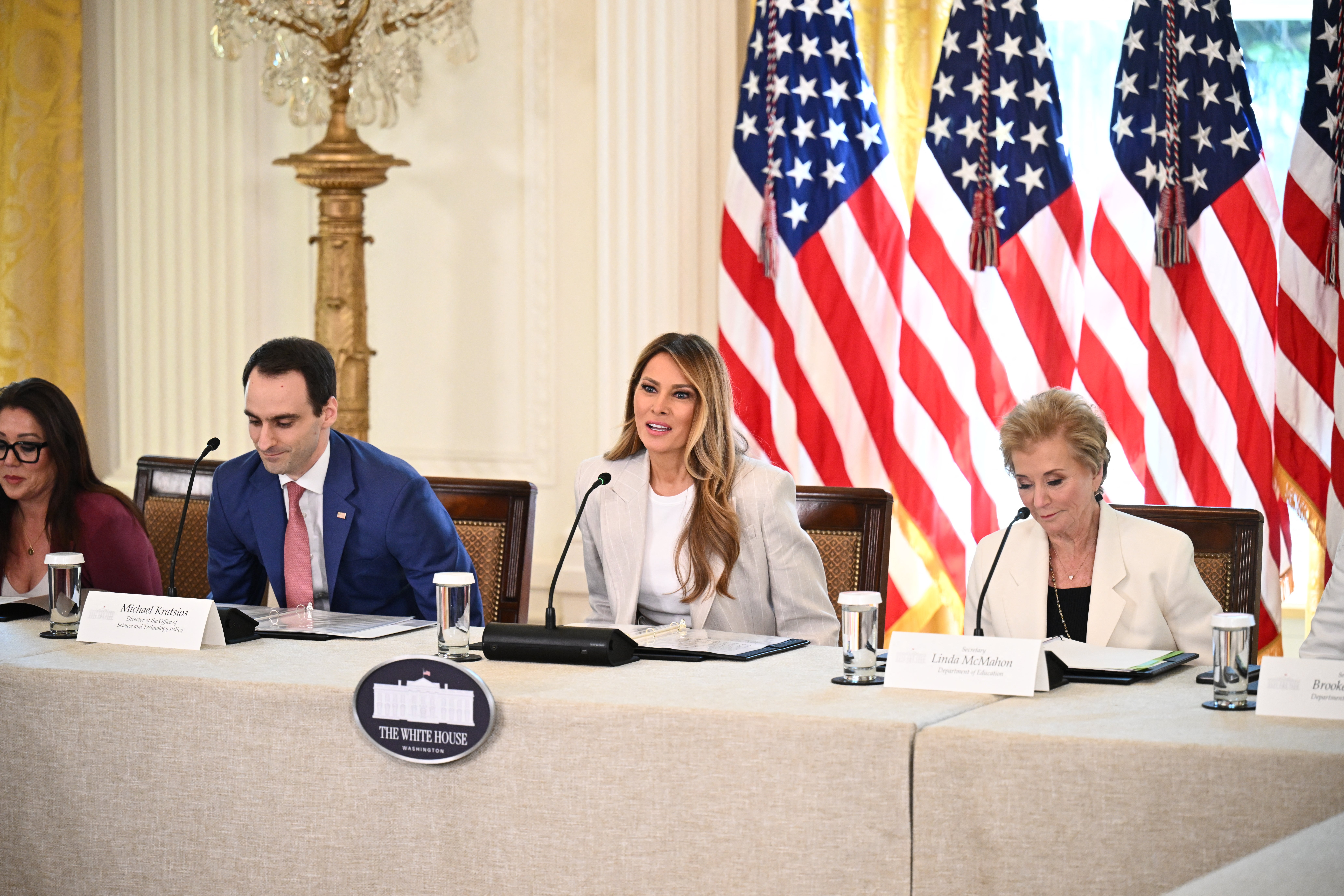 Melania Trump speaks, alongside Secretary of Education Linda McMahon and Director of the Office of Science and technology policy Michael Kratsios during the meeting.