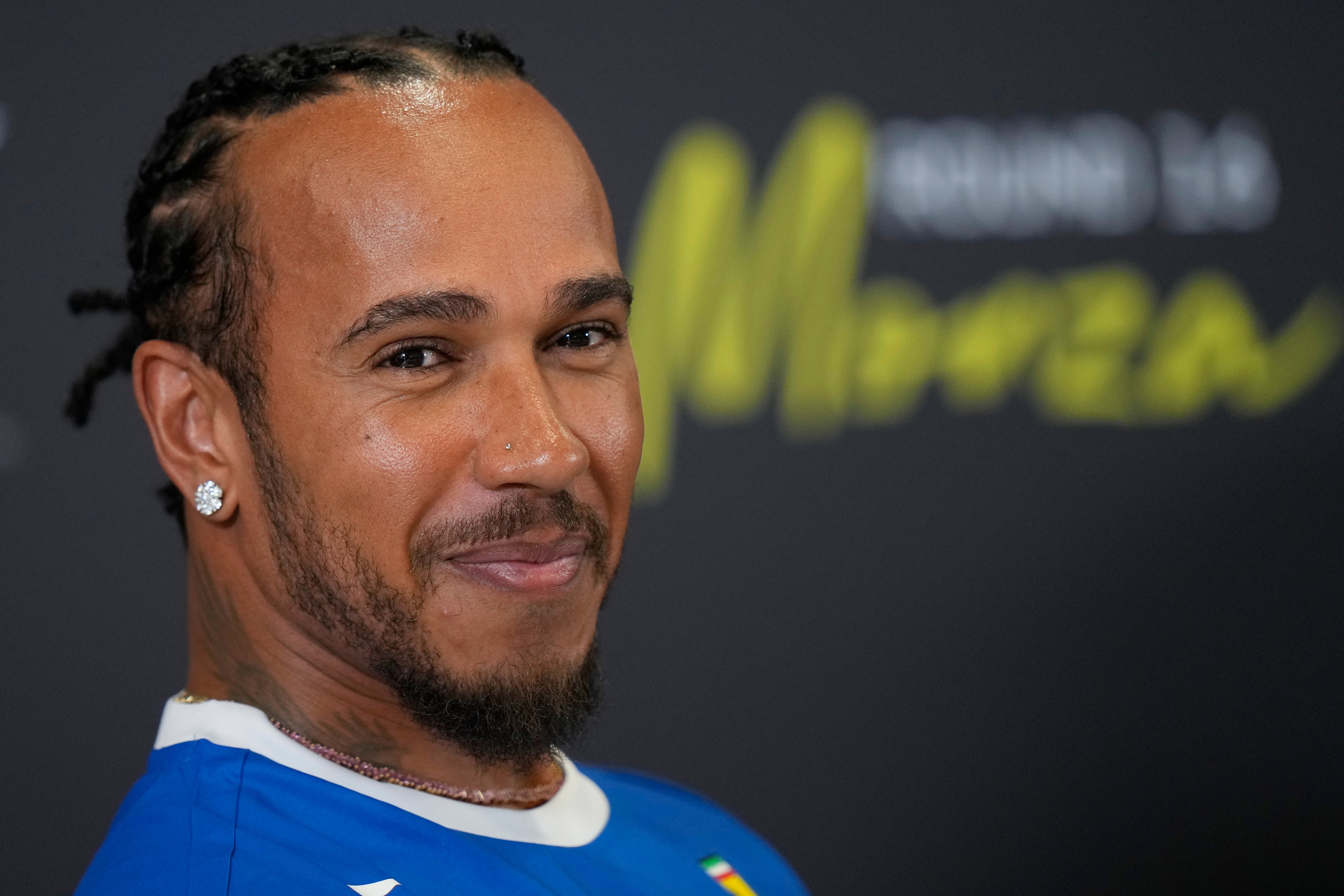 Hamilton cut a happier figure after the performance at Monza