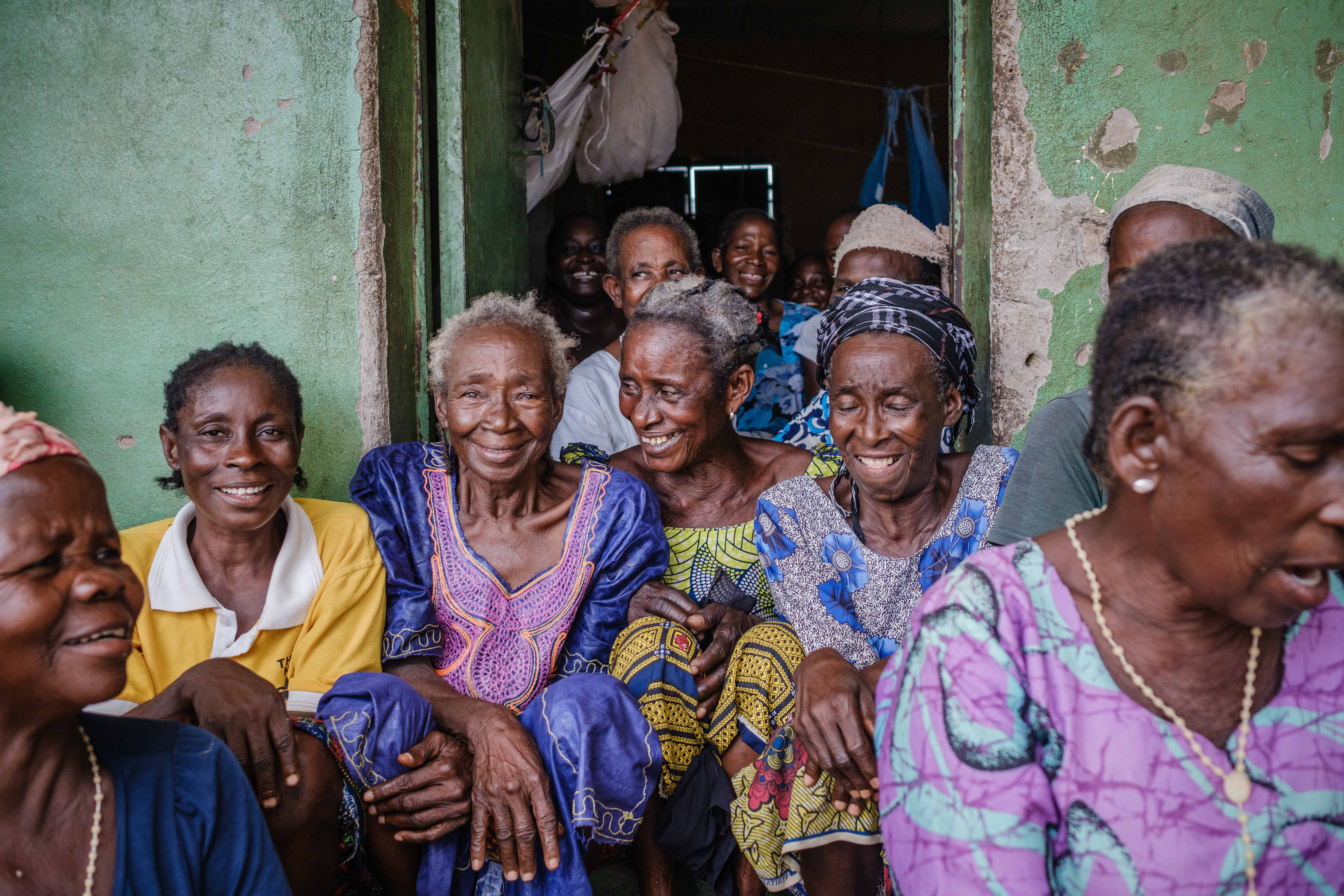 Elderly women gather in Agagbe IDP Camp. UNHCR describes IDPs as ‘among the most vulnerable people in the world’