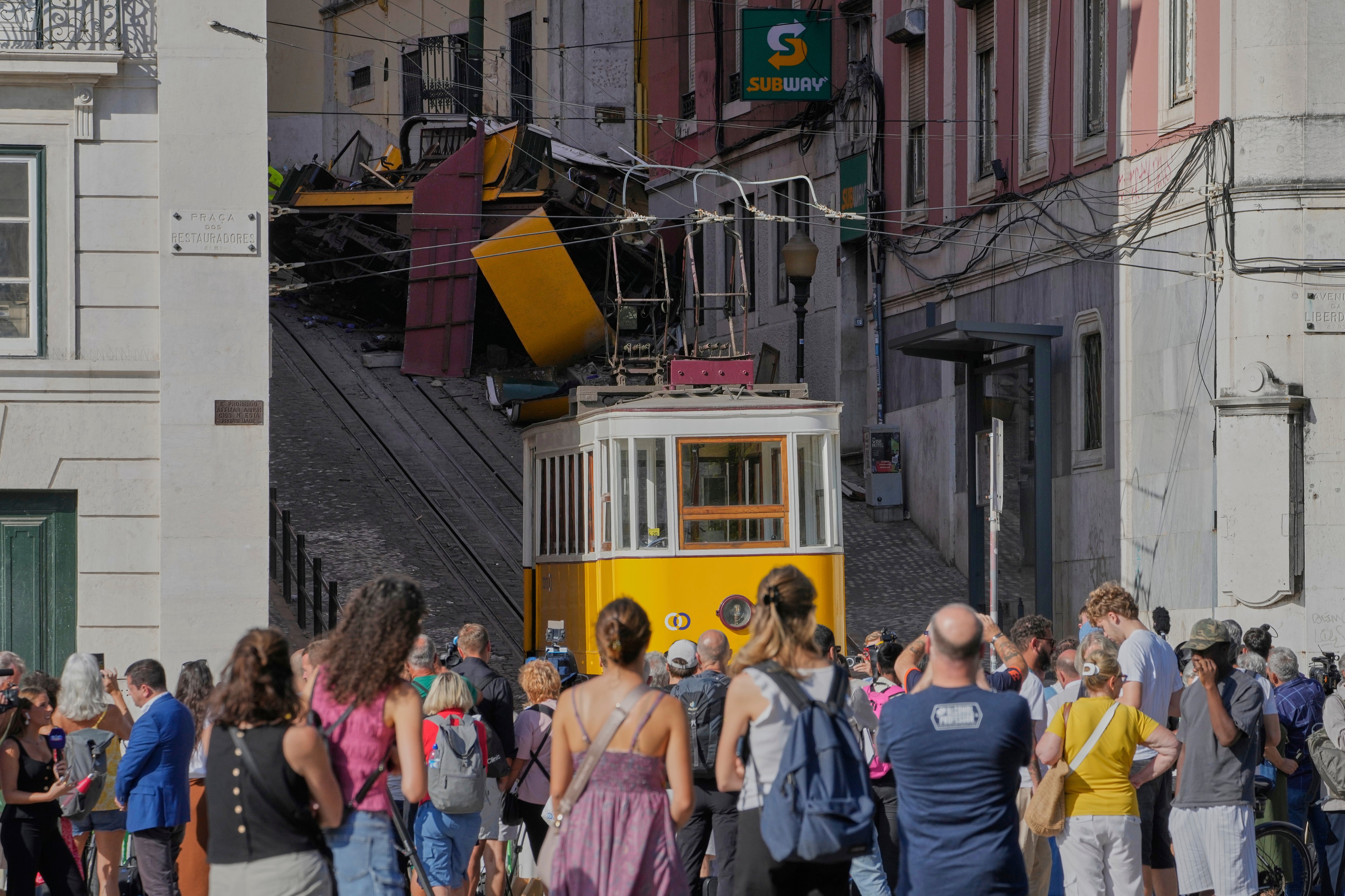 APTOPIX Portugal Streetcar Derailed