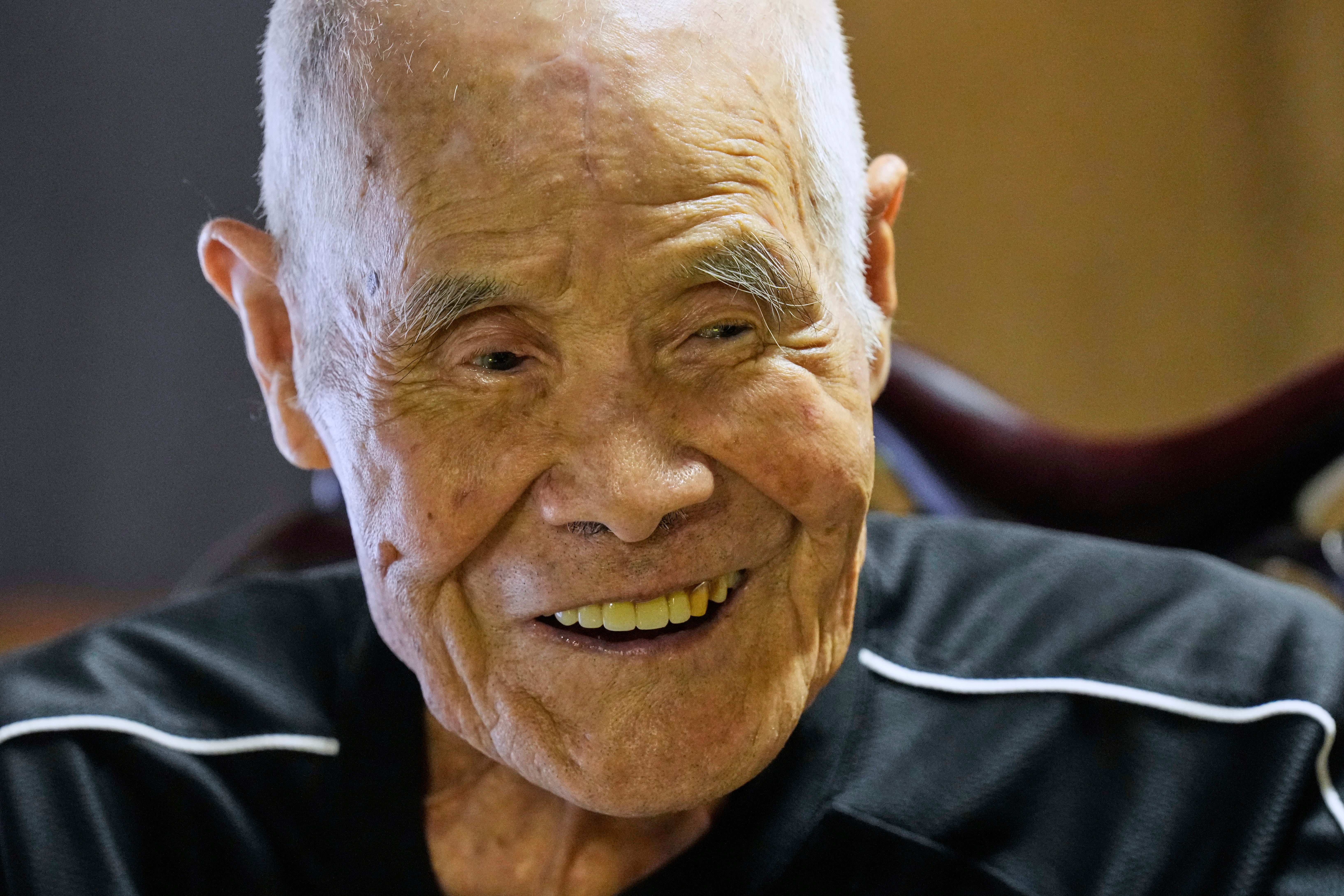 Kokichi Akuzawa, recently recognized by Guinness World Records as the oldest person to climb Mount Fuji (male), speaks during an interview with the Associated Press in Maebashi, northeast of Tokyo, Wednesday, Sept. 3, 2025. (AP Photo/Hiro Komae)